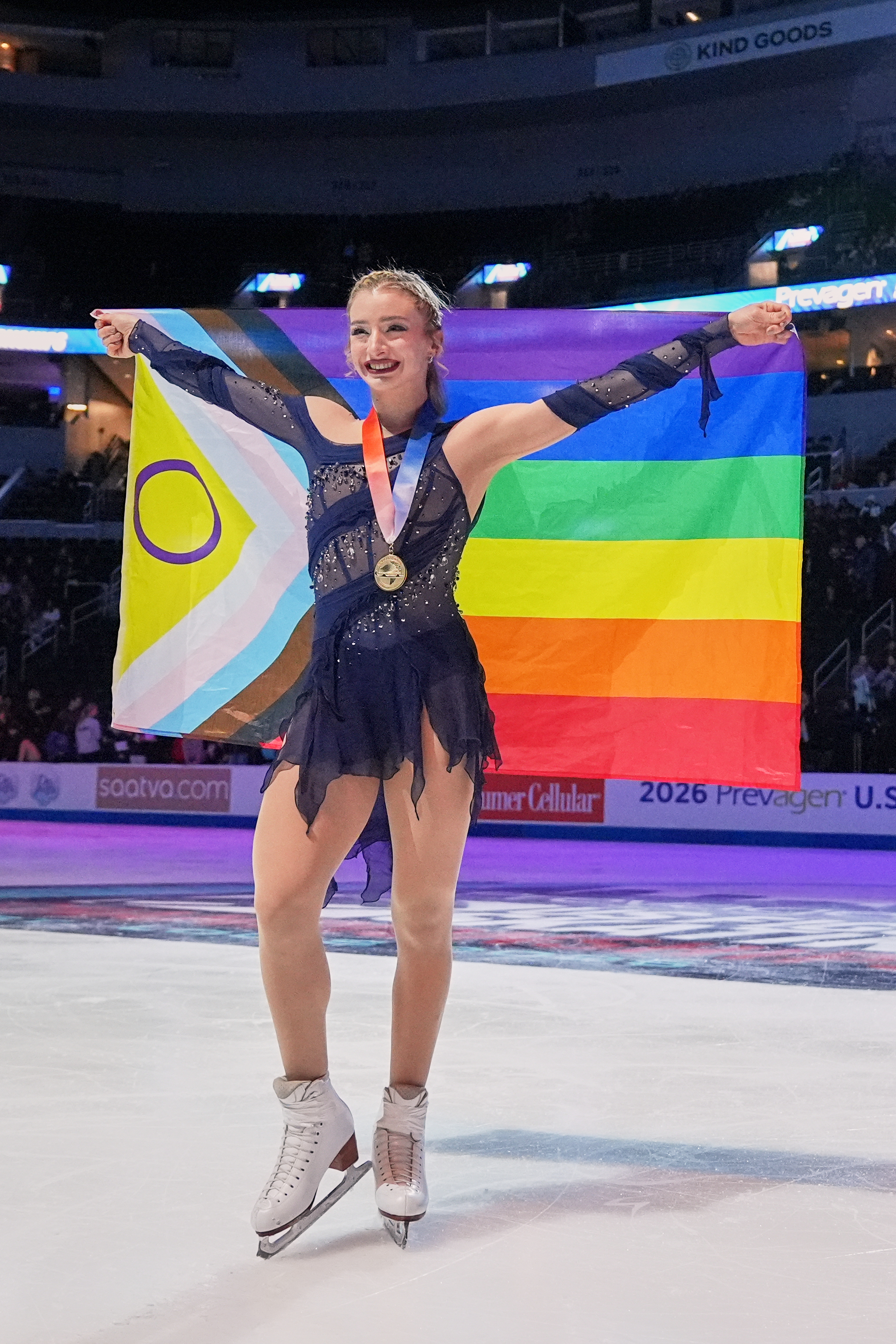 Gold medalist Amber Glenn poses with a flag after the women's free skating competition at the U.S. Figure Skating Championships, Jan. 9, in St. Louis. (AP Photo/Stephanie Scarbrough).
