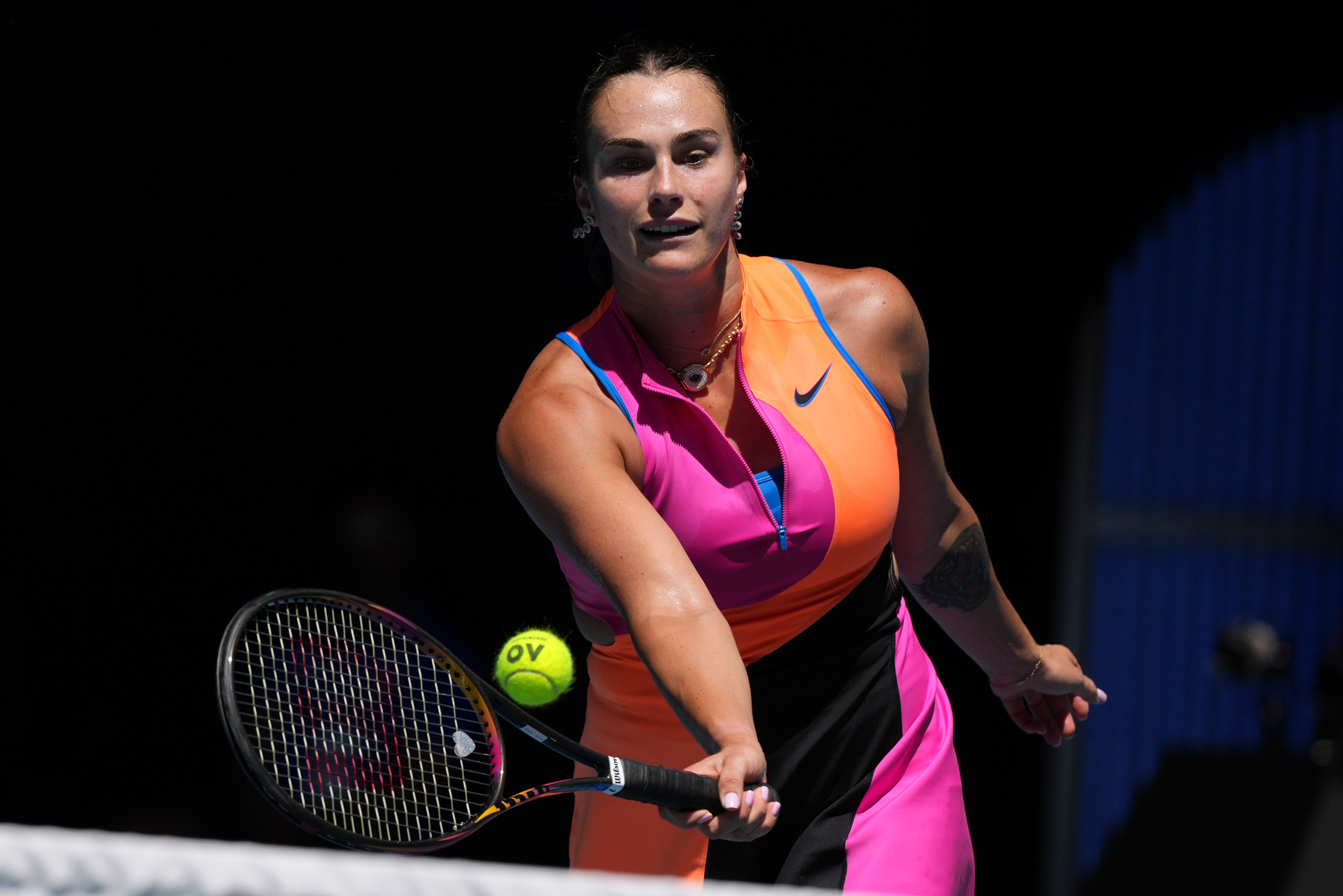 Aryna Sabalenka of Belarus plays a forehand return to Iva Jovic of the U.S. during their quarterfinal match at the Australian Open tennis championship in Melbourne, Australia, Tuesday, Jan. 27, 2026.
