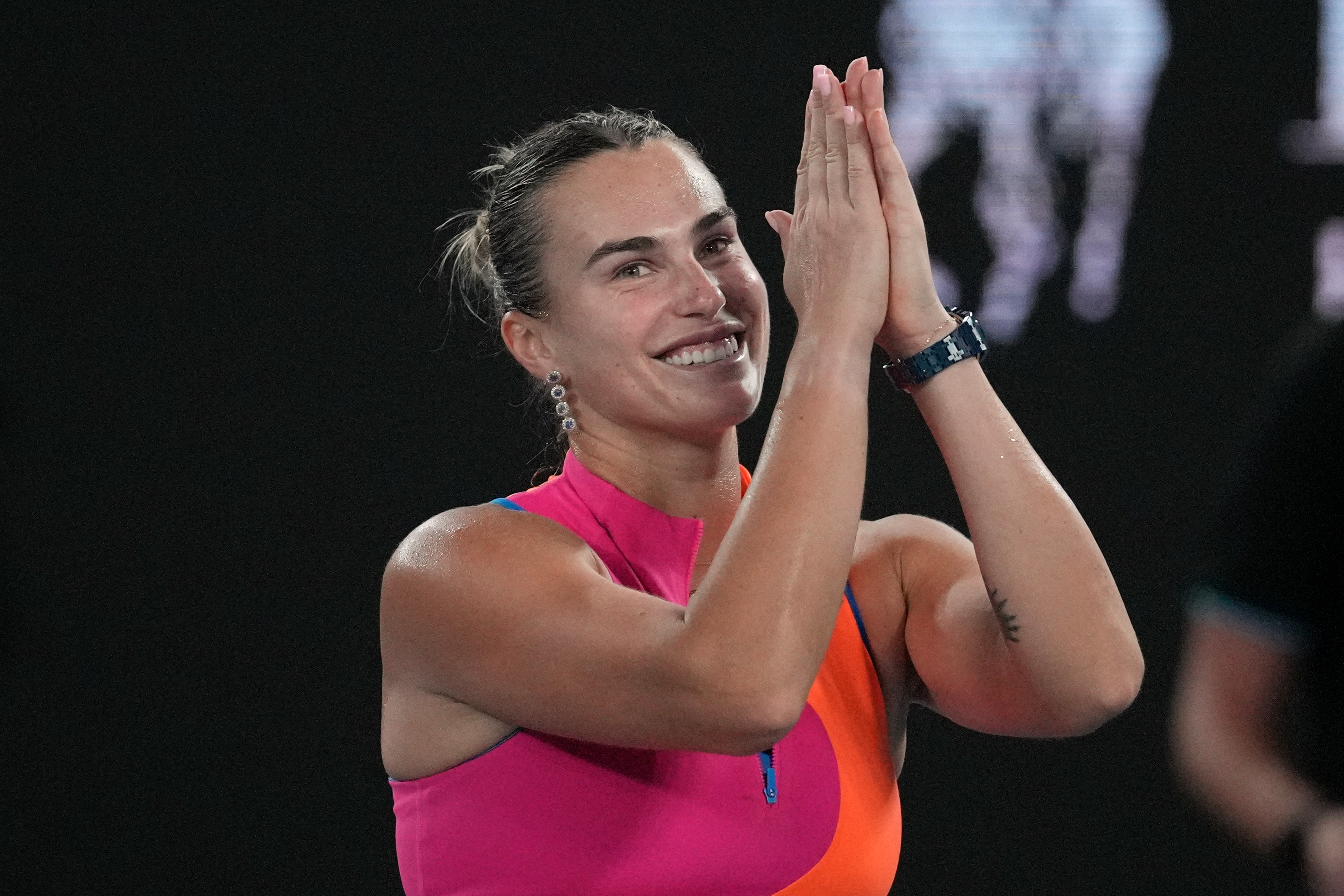 Aryna Sabalenka of Belarus celebrates after defeating Elina Svitolina of Ukraine in their semifinal match at the Australian Open tennis championship in Melbourne, Australia, Thursday, Jan. 29, 2026. (AP Photo/Dita Alangkara)