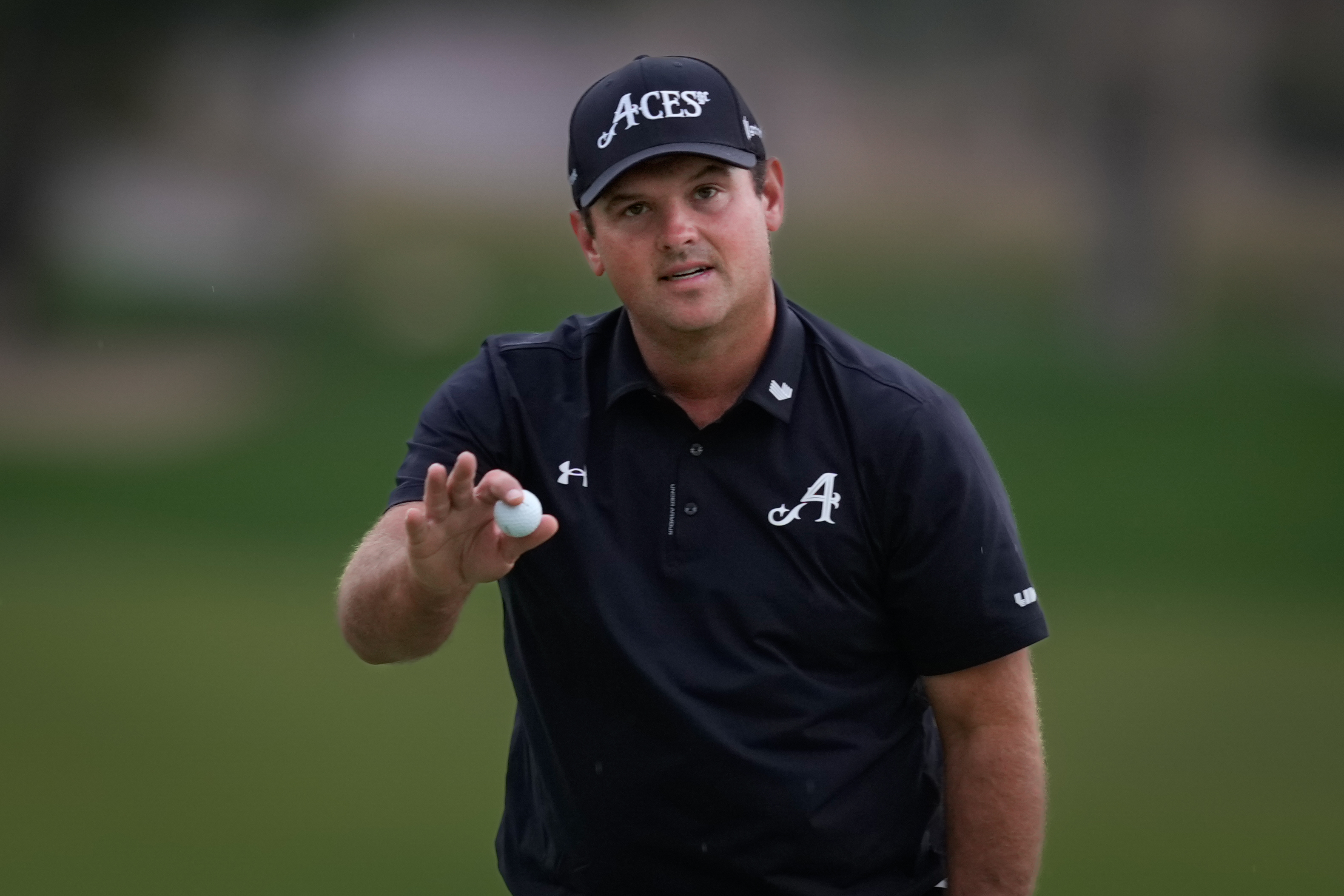 Patrick Reed of the United States reacts after winning the Dubai Desert Classic in United Arab Emirates, Sunday, Jan. 25, 2026. (AP Photo/Altaf Qadri)