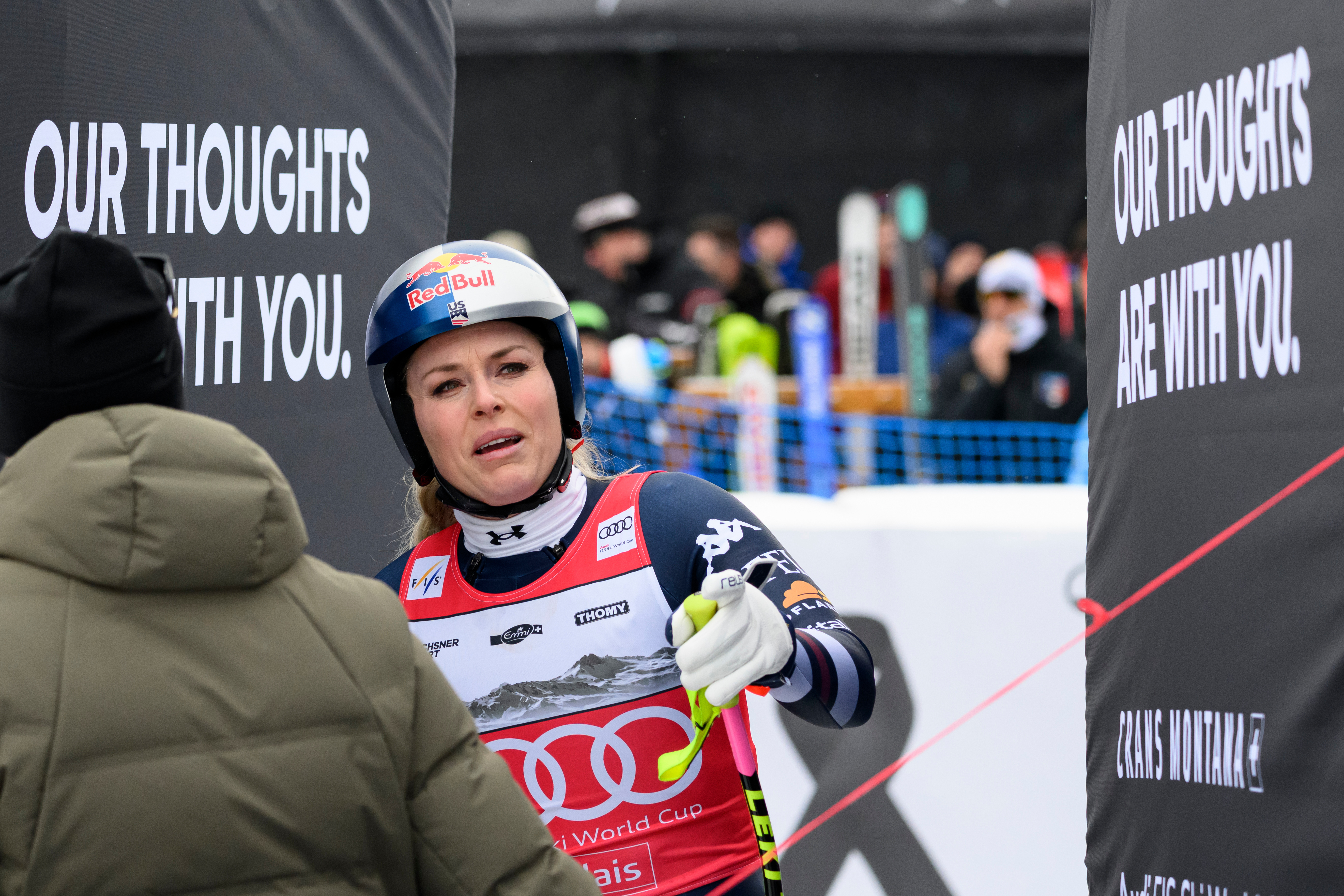 United States' Lindsey Vonn at the finish area after crashing, during an alpine ski, women’s World Cup downhill, in Crans Montana, Switzerland, Friday, Jan. 30, 2026.