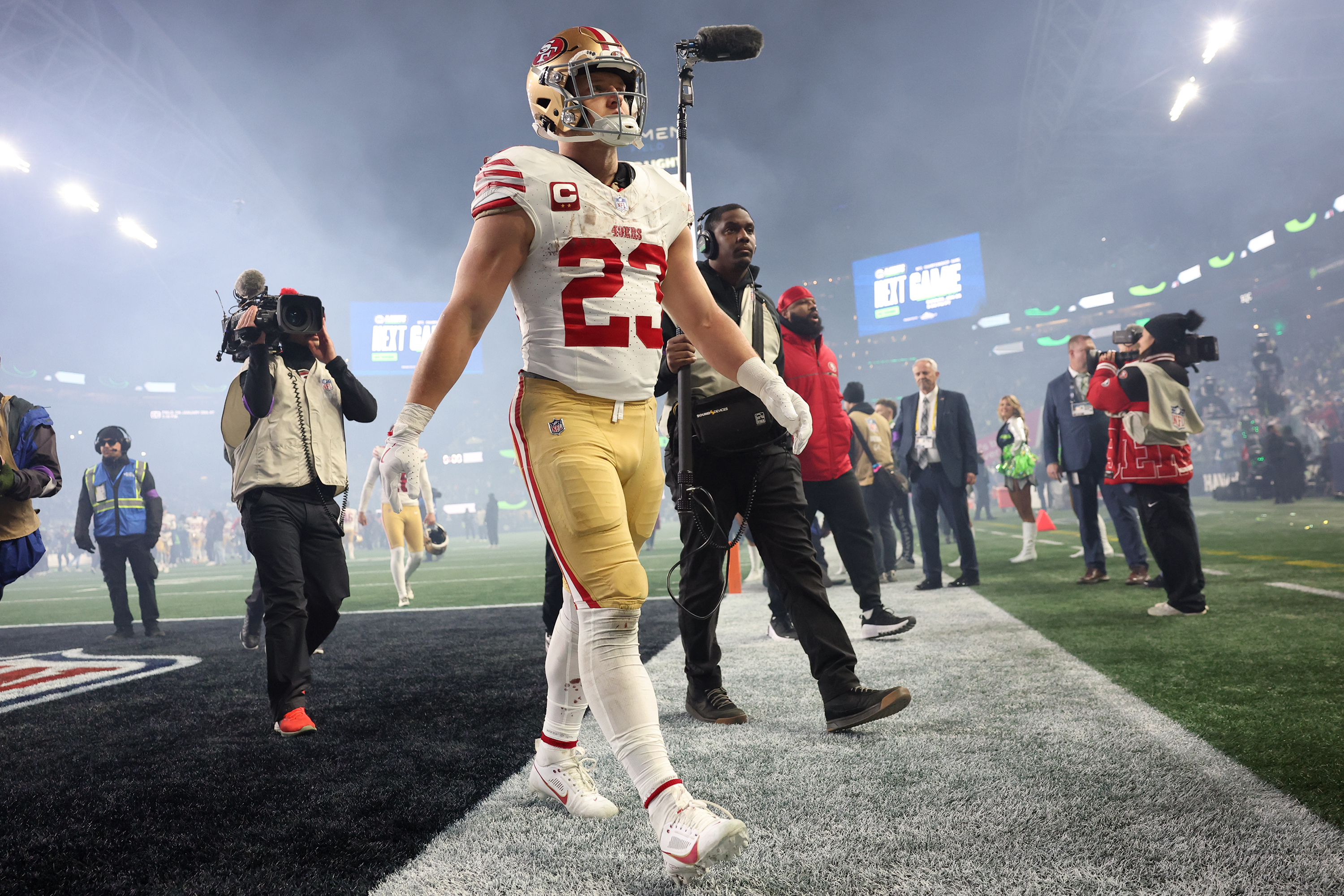 San Francisco 49ers' Christian McCaffrey walks off the field after an NFL football divisional playoff game against the Seattle Seahawks, Saturday, Jan. 17, 2026, in Seattle.