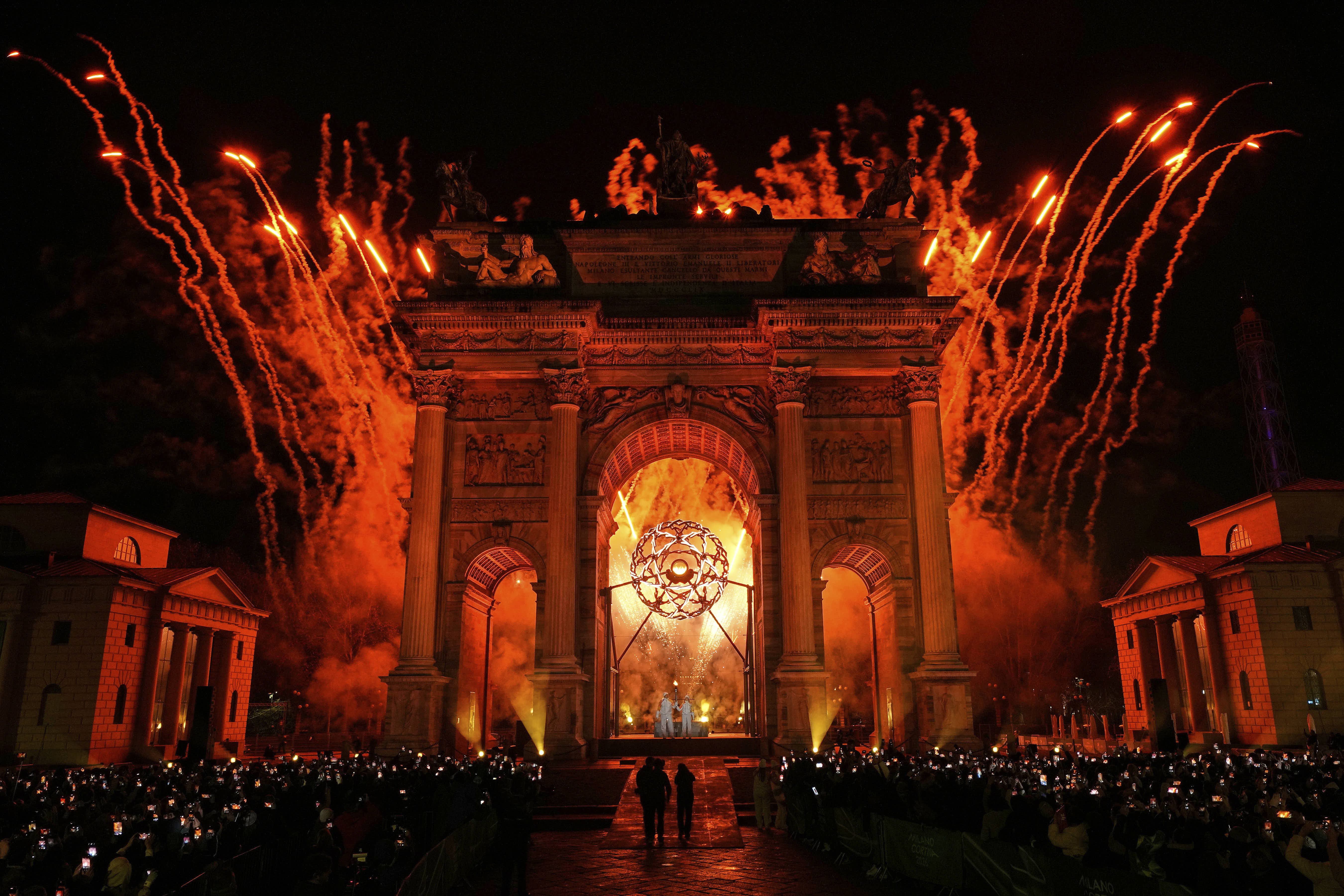The cauldron at the Arco della Pace is lit at the 2026 Winter Olympics ceremony in Milan, Italy.