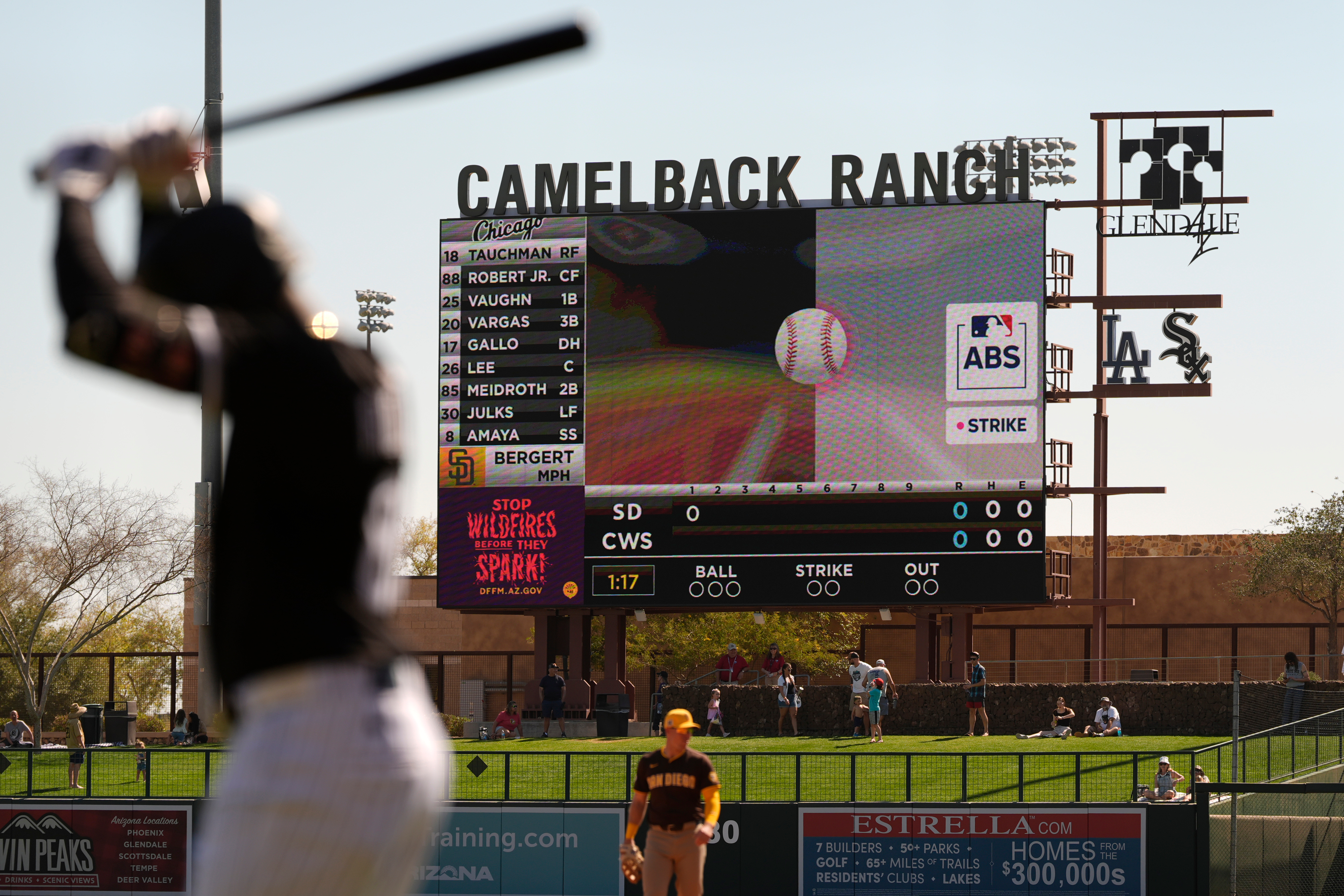 FILE - The Automated Ball-Strike System plays on the scoreboard after a pitch call was challenged during the first inning of a spring training baseball game between the Chicago White Sox and the San Diego Padres, Feb. 26, 2025, in Phoenix.