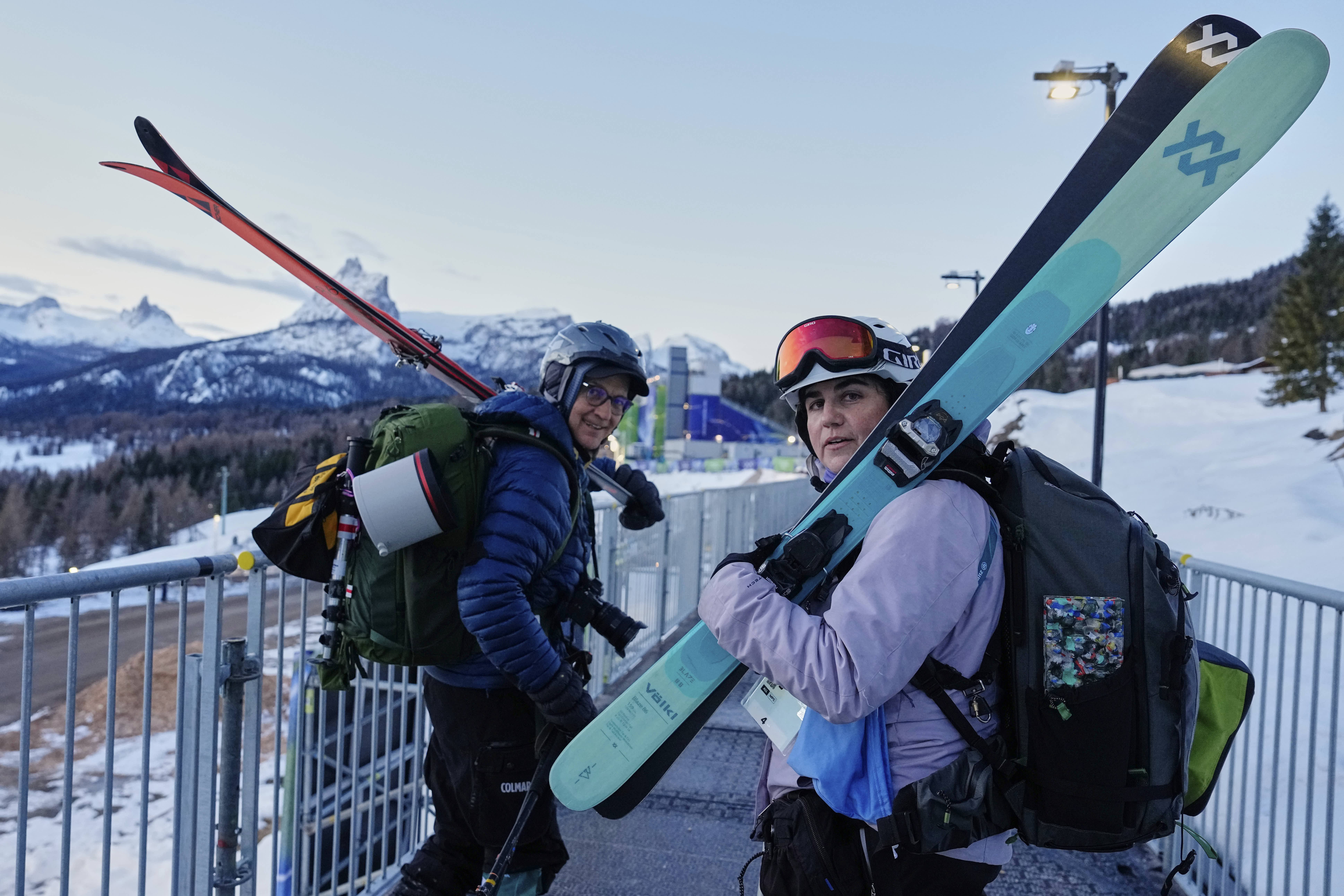 Associated Press photographers Jacquelyn Martin and Robert F. Bukaty head out to cover the women's giant slalom race in Cortina d'Ampezzo, Italy. 
