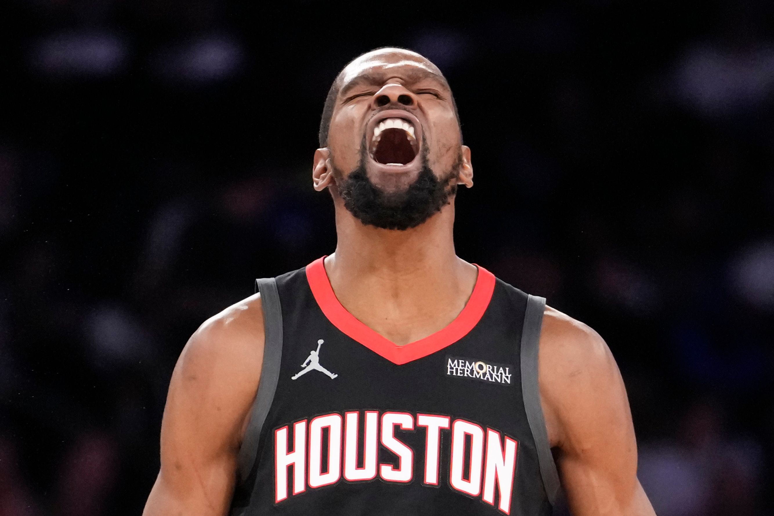 Houston Rockets forward Kevin Durant (7) reacts after scoring a 3-point goal during the second half of an NBA basketball game, Saturday, Feb. 21, 2026, in New York.
