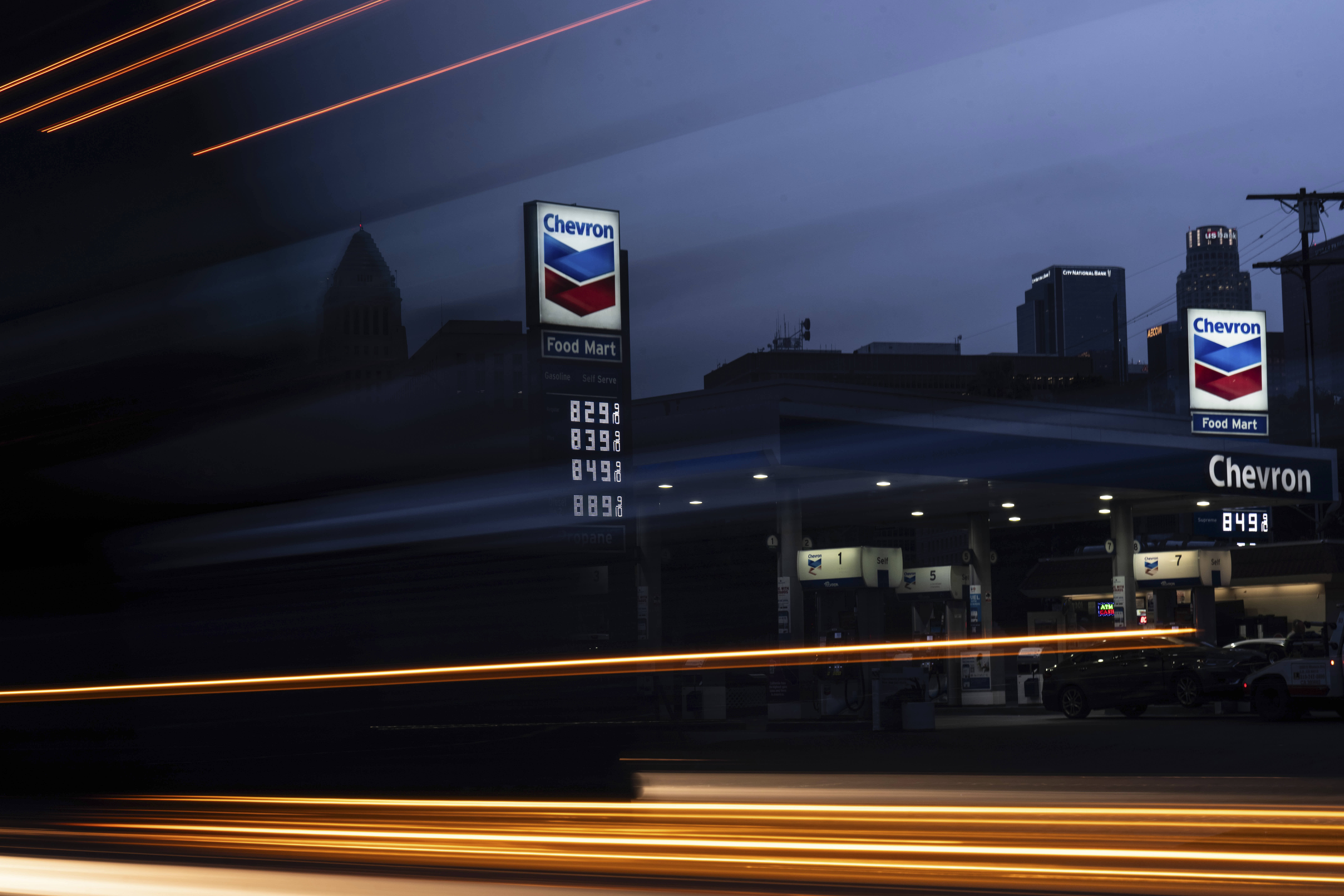 A truck drives past a Chevron station in downtown Los Angeles.