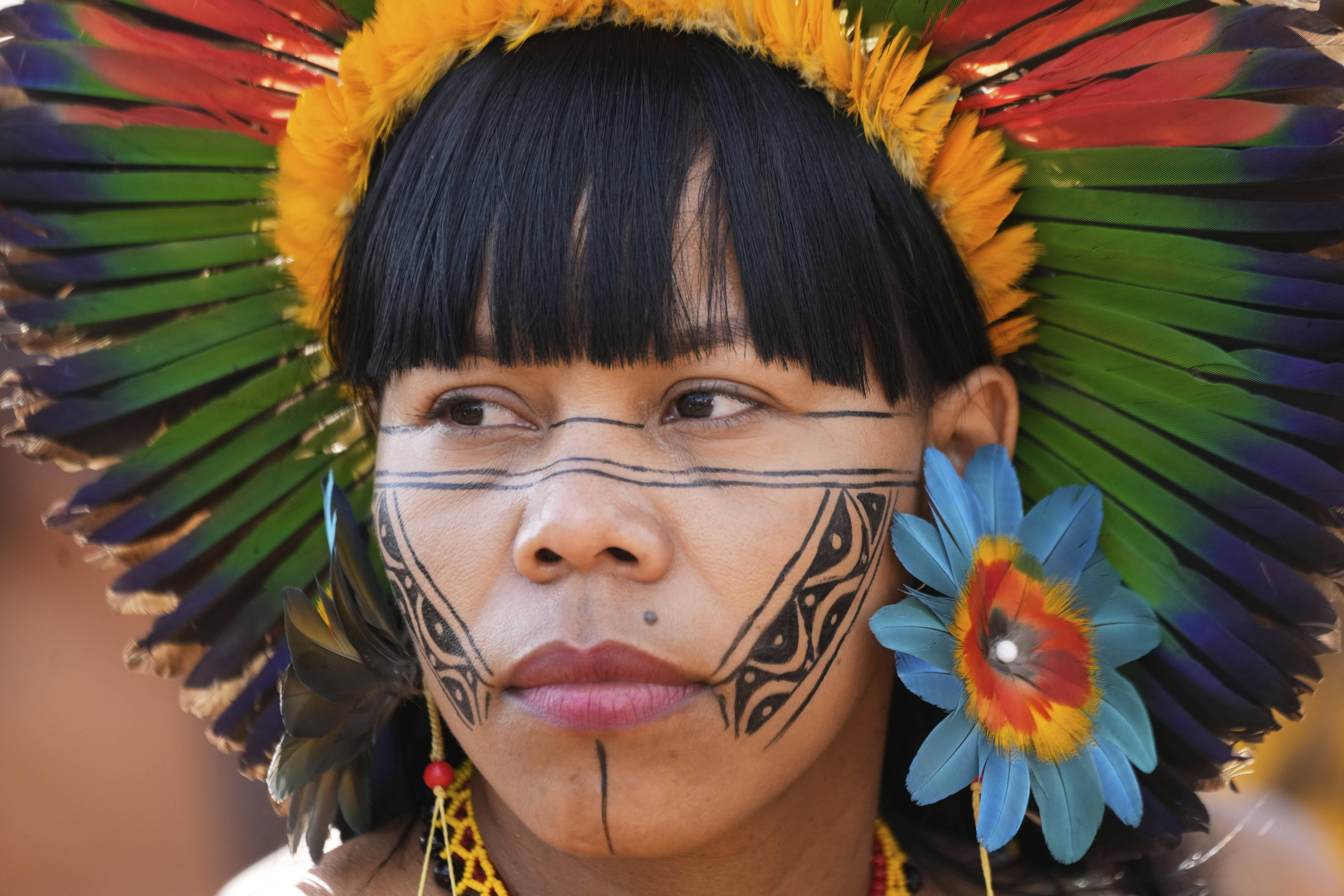 A Xakriaba Indigenous woman attends a Free Land Encampment march in Brasilia.