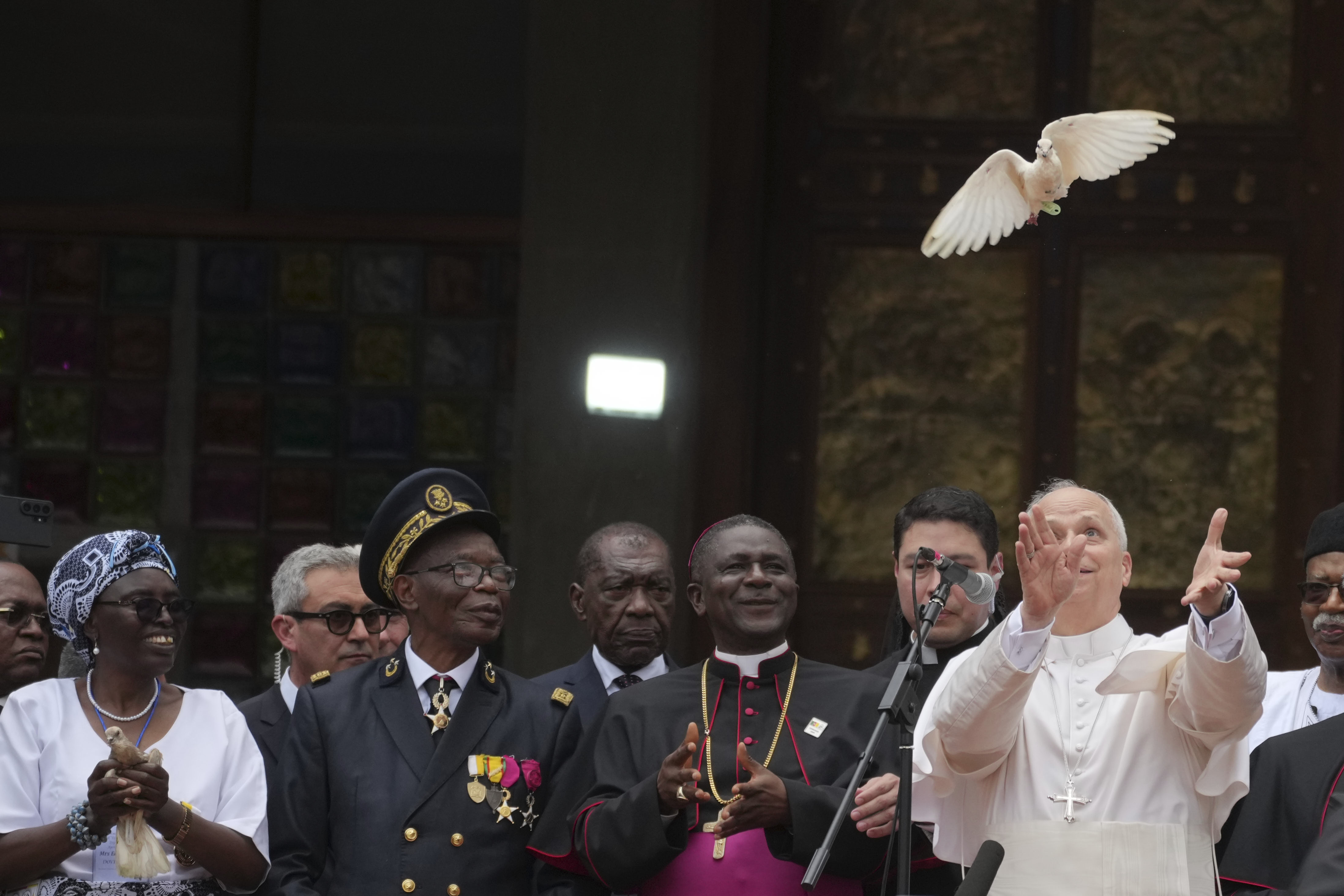 Pope Leo XIV releases a dove at Saint Joseph's Cathedral in Bamenda, Cameroon.