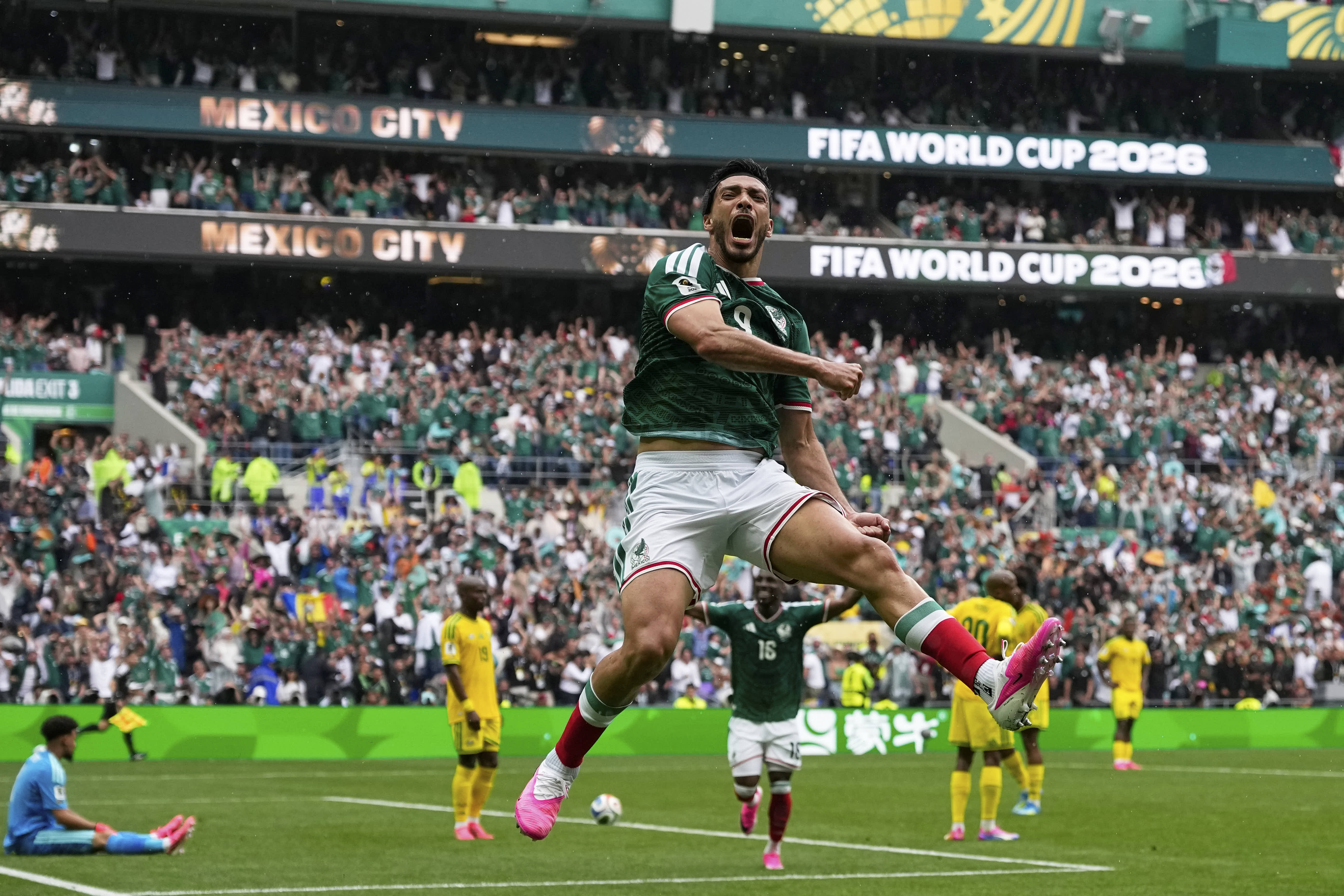 Mexico's Raul Jimenez celebrates after scoring in the World Cup opening match against South Africa, in Mexico City. 