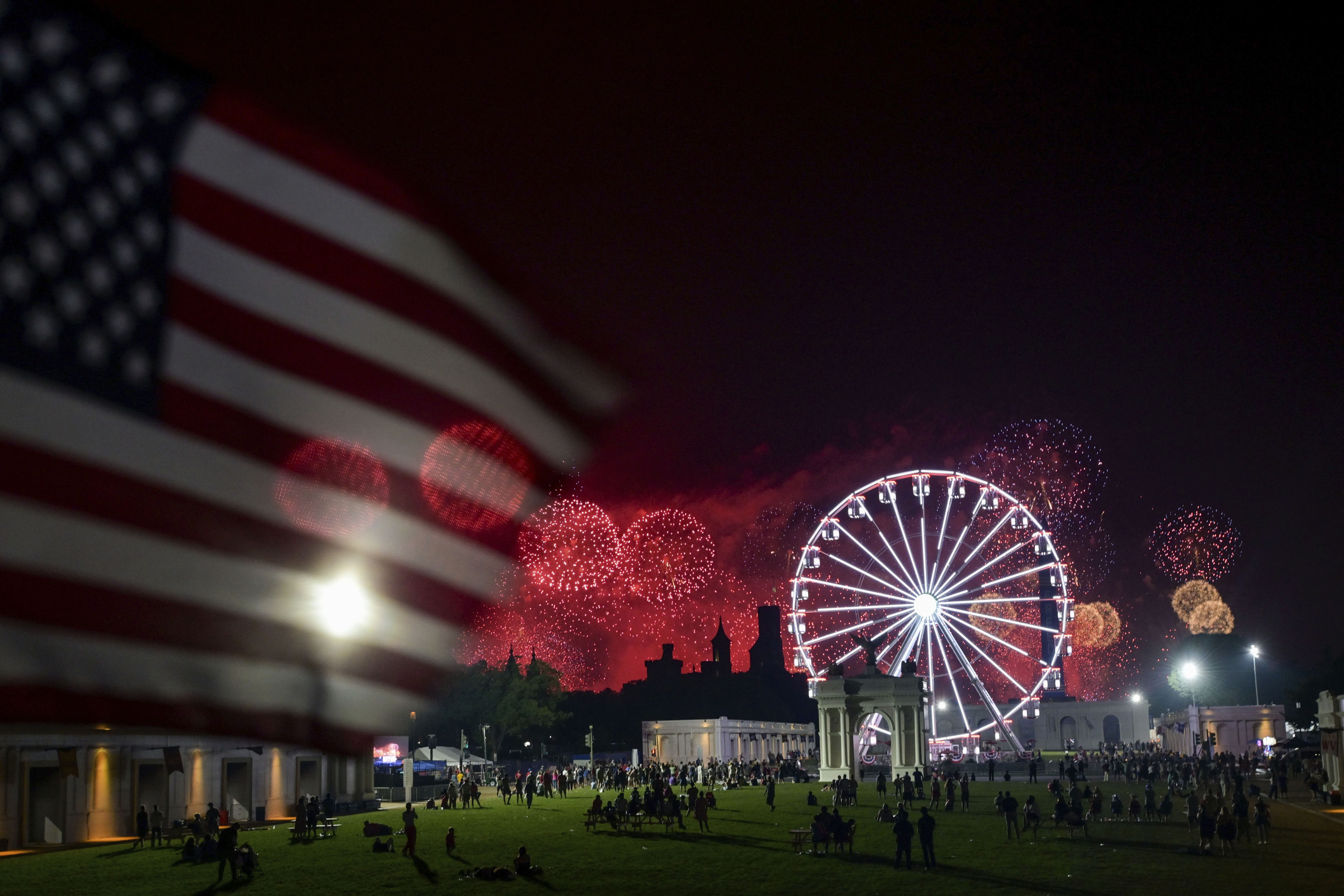Fireworks explode over the National Mall during Independence Day in Washington. 