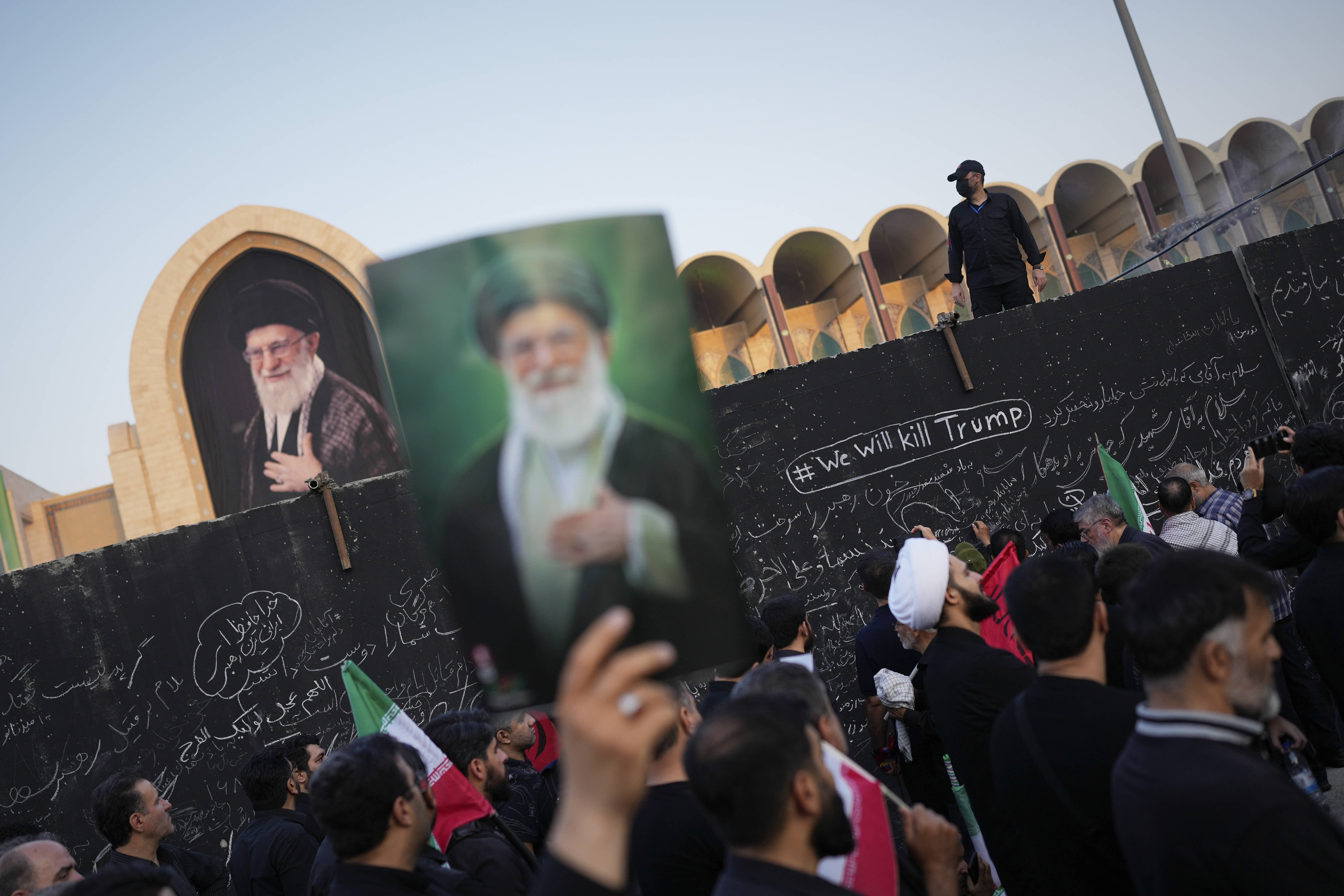 A mourner attends a funeral ceremony for the late Supreme Leader Ayatollah Ali Khamenei and members of Khamenei’s family in Tehran. 