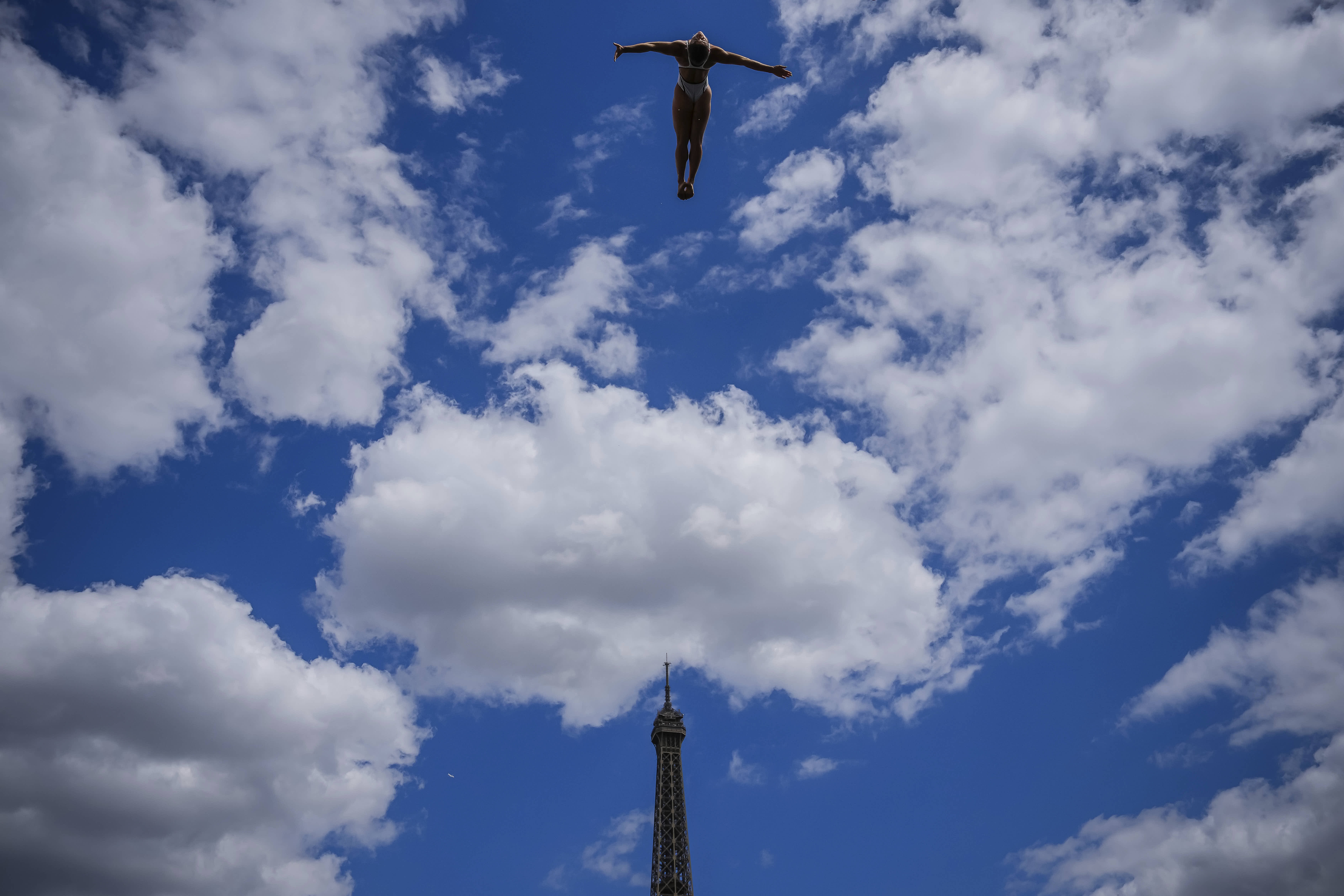 A diver in action during a practice session at the European Aquatics Championships in Paris.