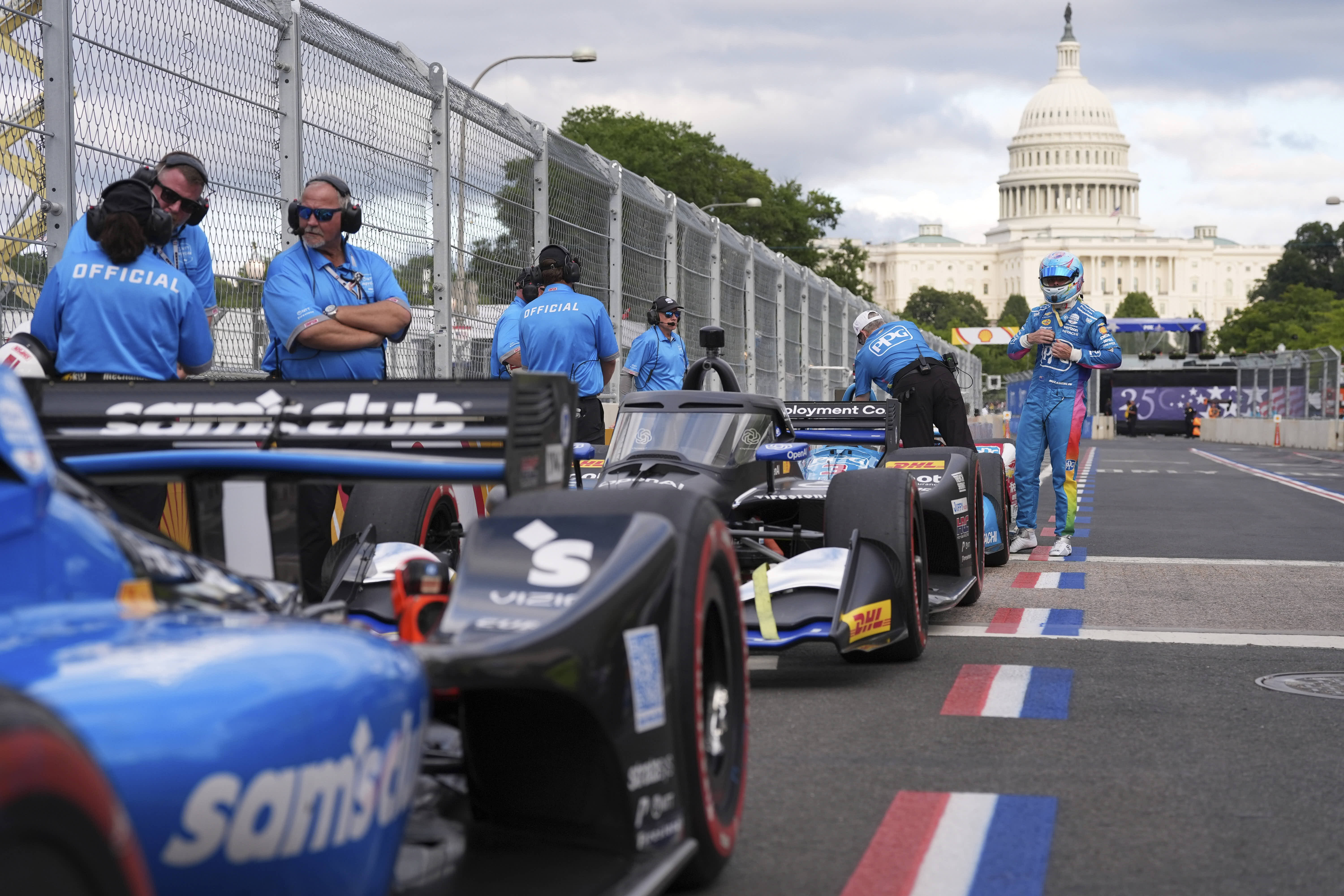 Scott McLaughlin stands alongside his car after qualifying for the Freedom 250 Grand Prix of Washington. 