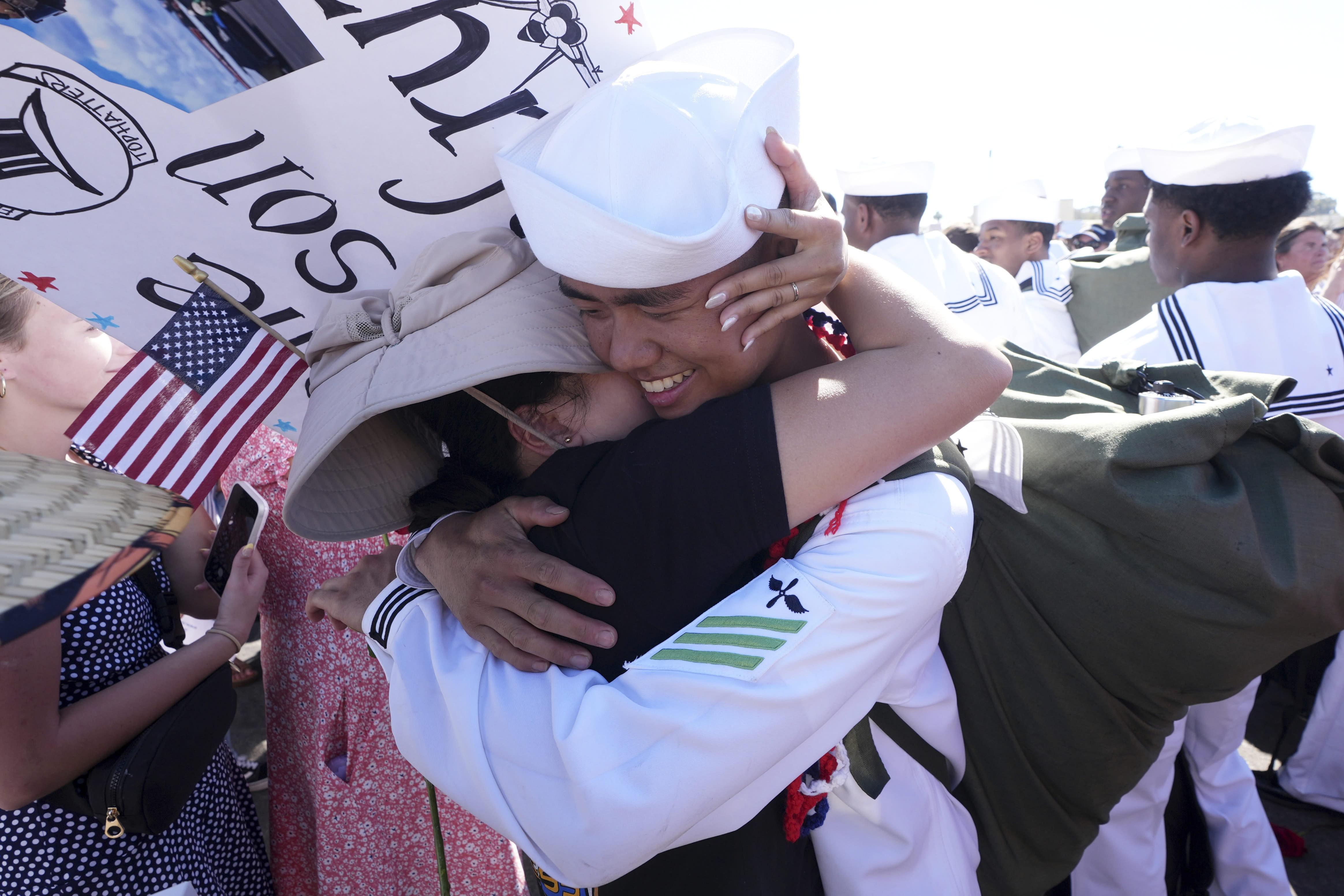 Erbin de la Cruz is embraced by his mother after the USS Abraham Lincoln returns home in Coronado, Calif. 