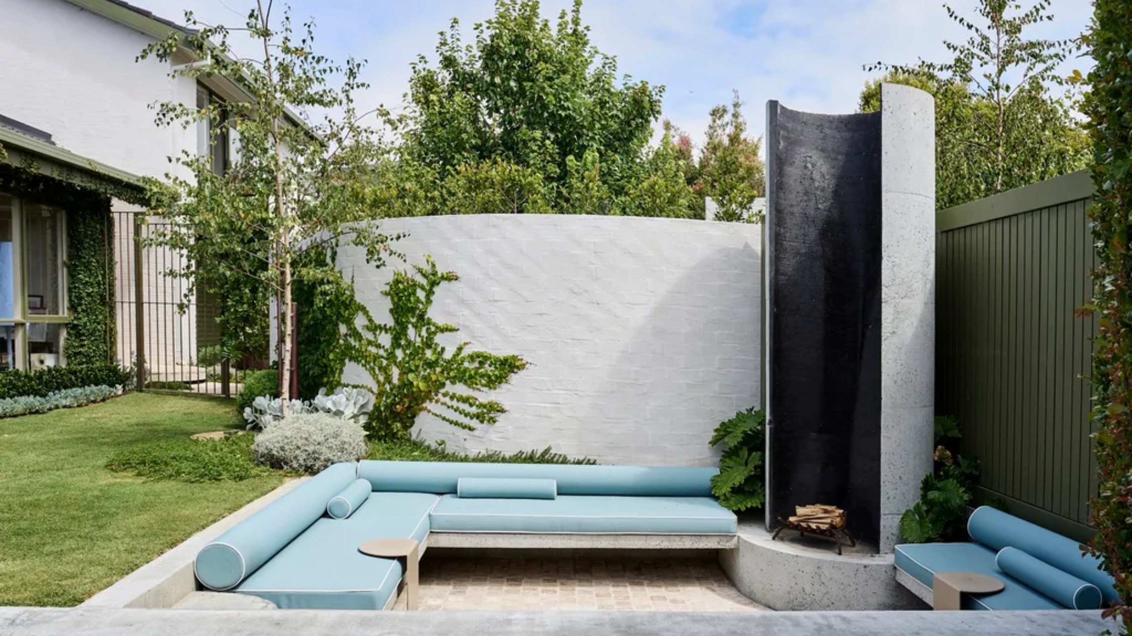 Family-oriented backyard design with a Tuscan twist