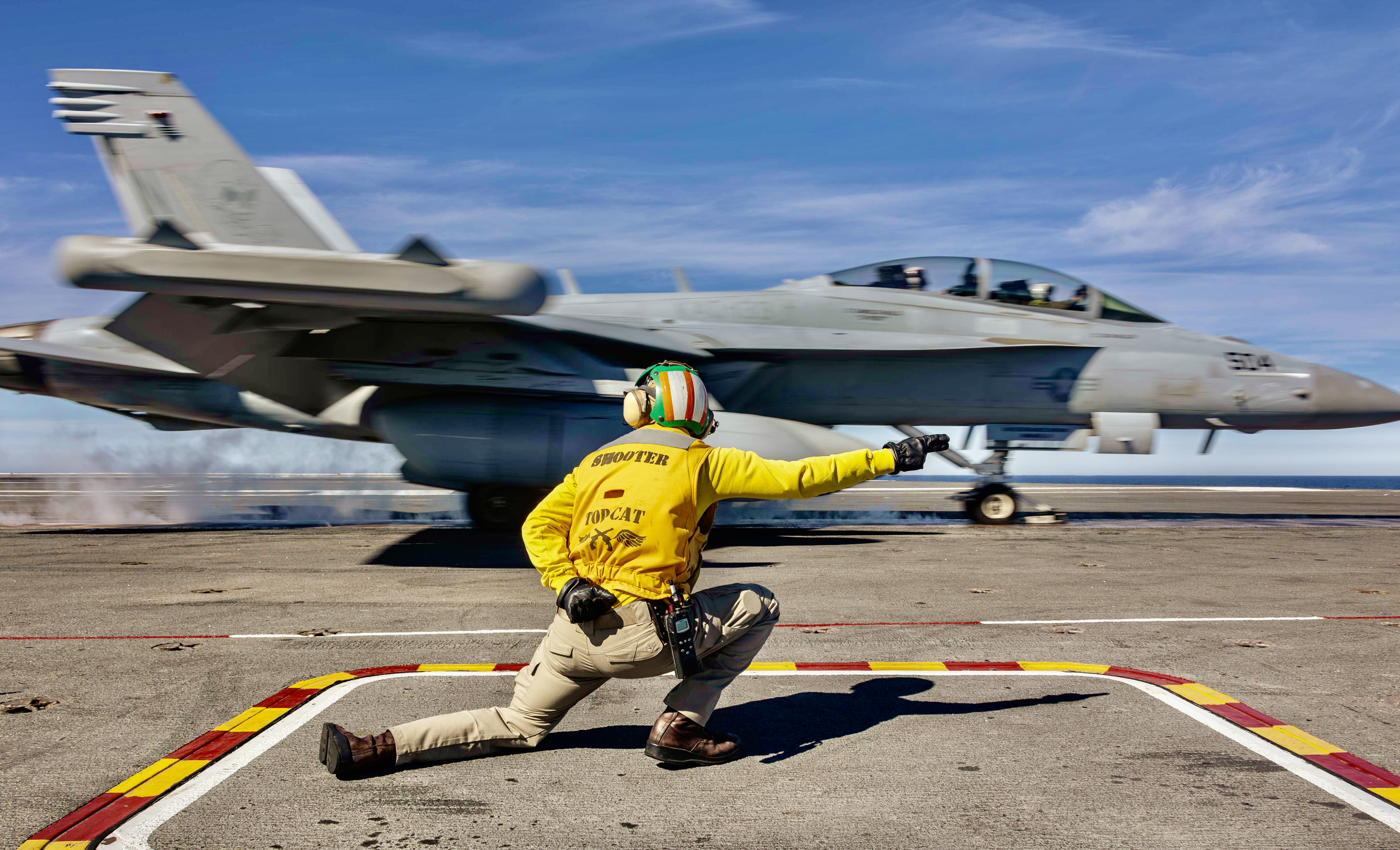Lt. Cmdr. Sean Smith shoots an EA-18G Growler assigned to Electronic Attack Squadron (VAQ) 133 from the flight deck of the Nimitz class aircraft carrier USS Abraham Lincoln, Pacific Ocean, January 27, 2024.