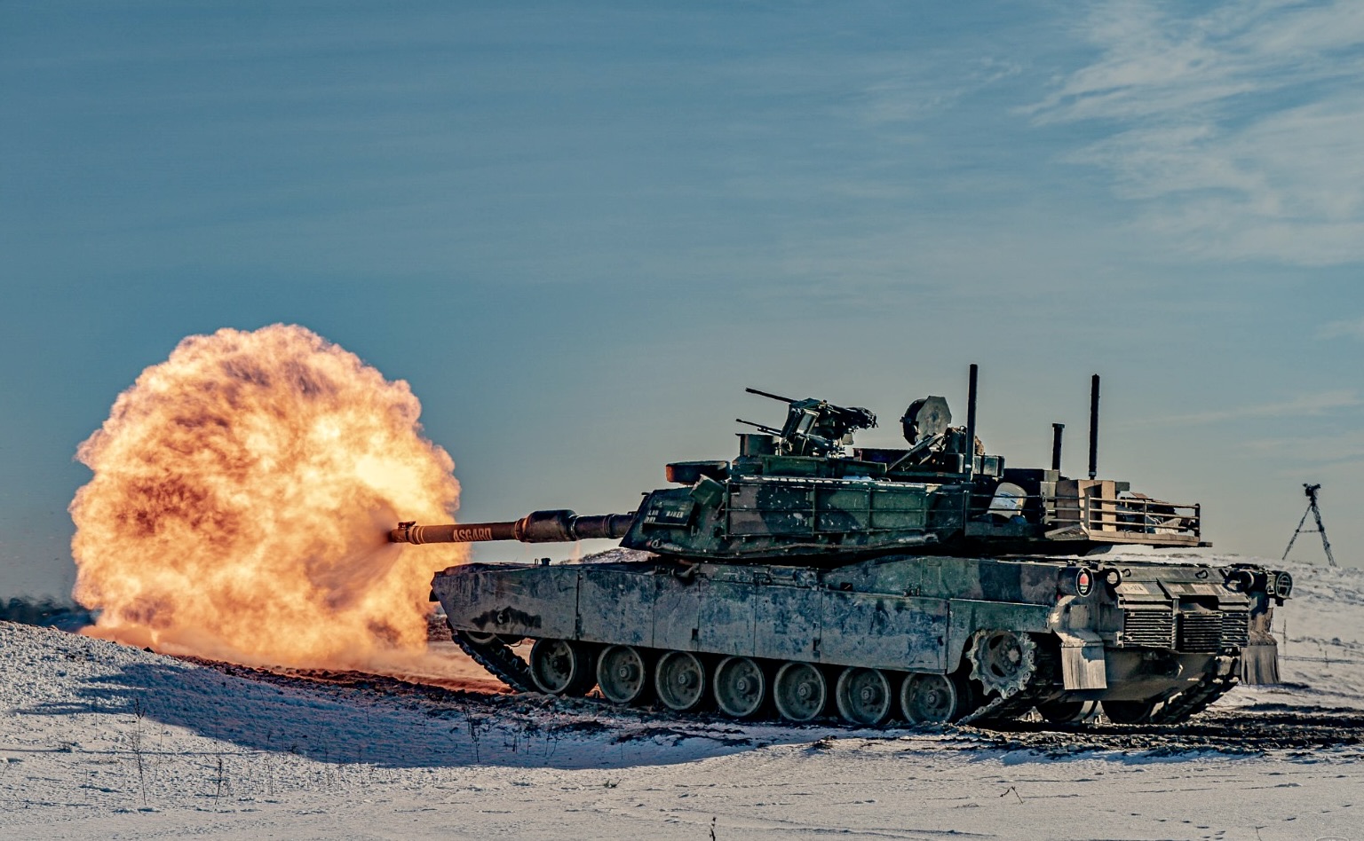 A U.S. M1A2 Abrams tank operated by a Polish tank crew fires during crew gunnery qualifications at Nowa Deba Training Area, Poland, January 17, 2024.