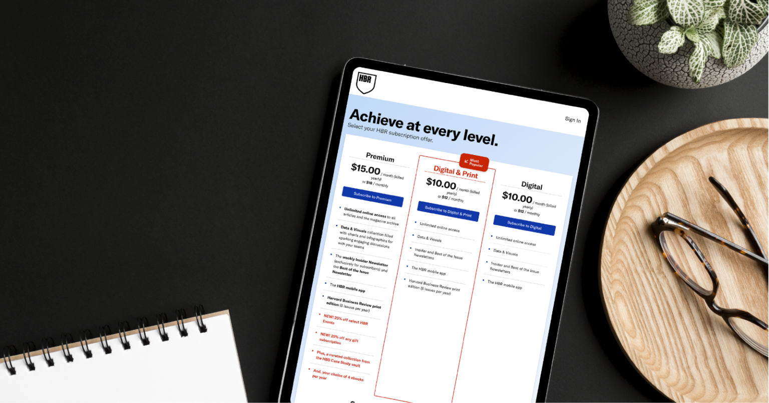 A tablet on a coffee table displaying the HBR subscriptions webpage.