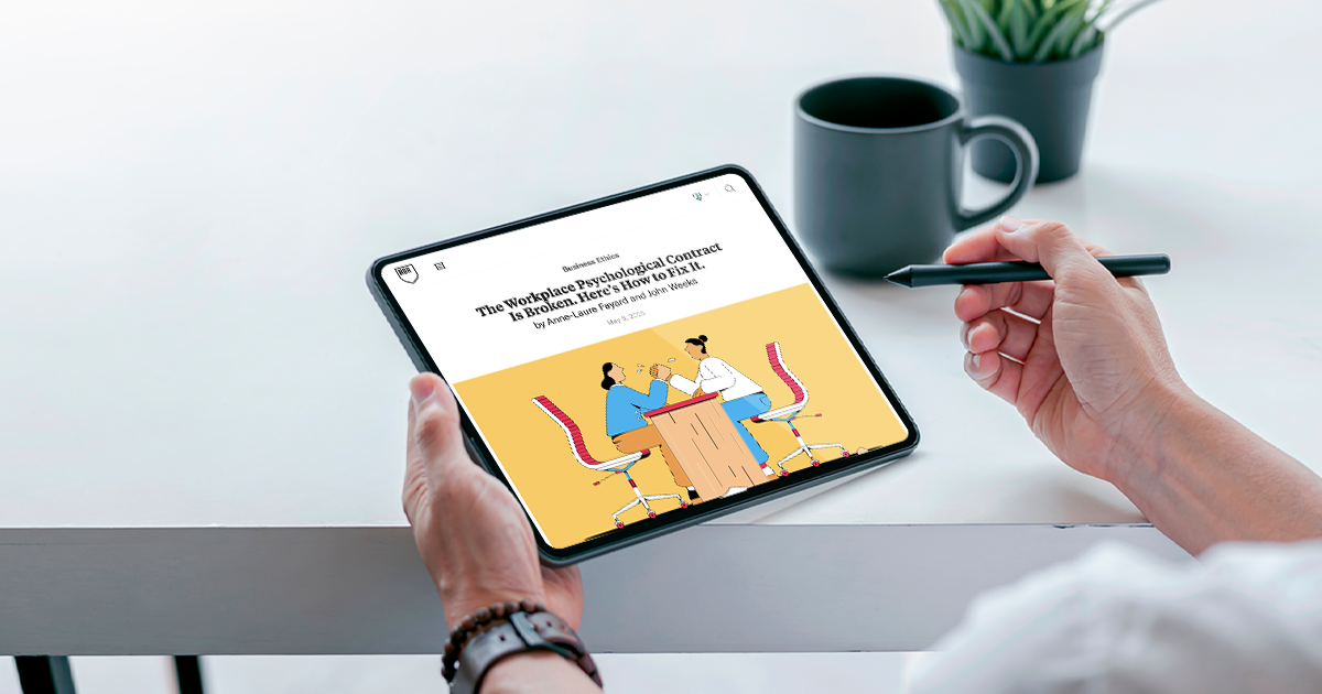 A tablet showing the HBR article The Workplace Psychological Contract is Broken. Here's How to Fix It.