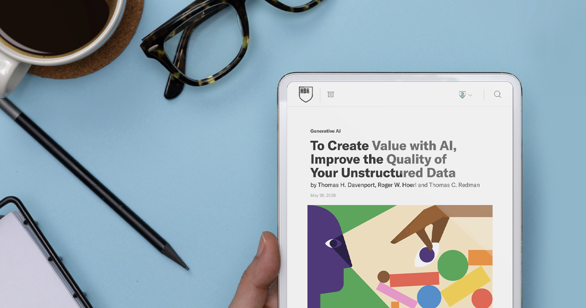 A tablet showing the HBR article To Create Value with AI, Improve the Quality of Your Unstructured Data.