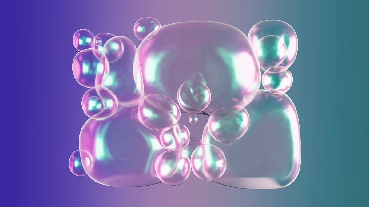 Abstract composition of translucent, iridescent bubble-like shapes in pink, purple, and blue tones against a gradient background.