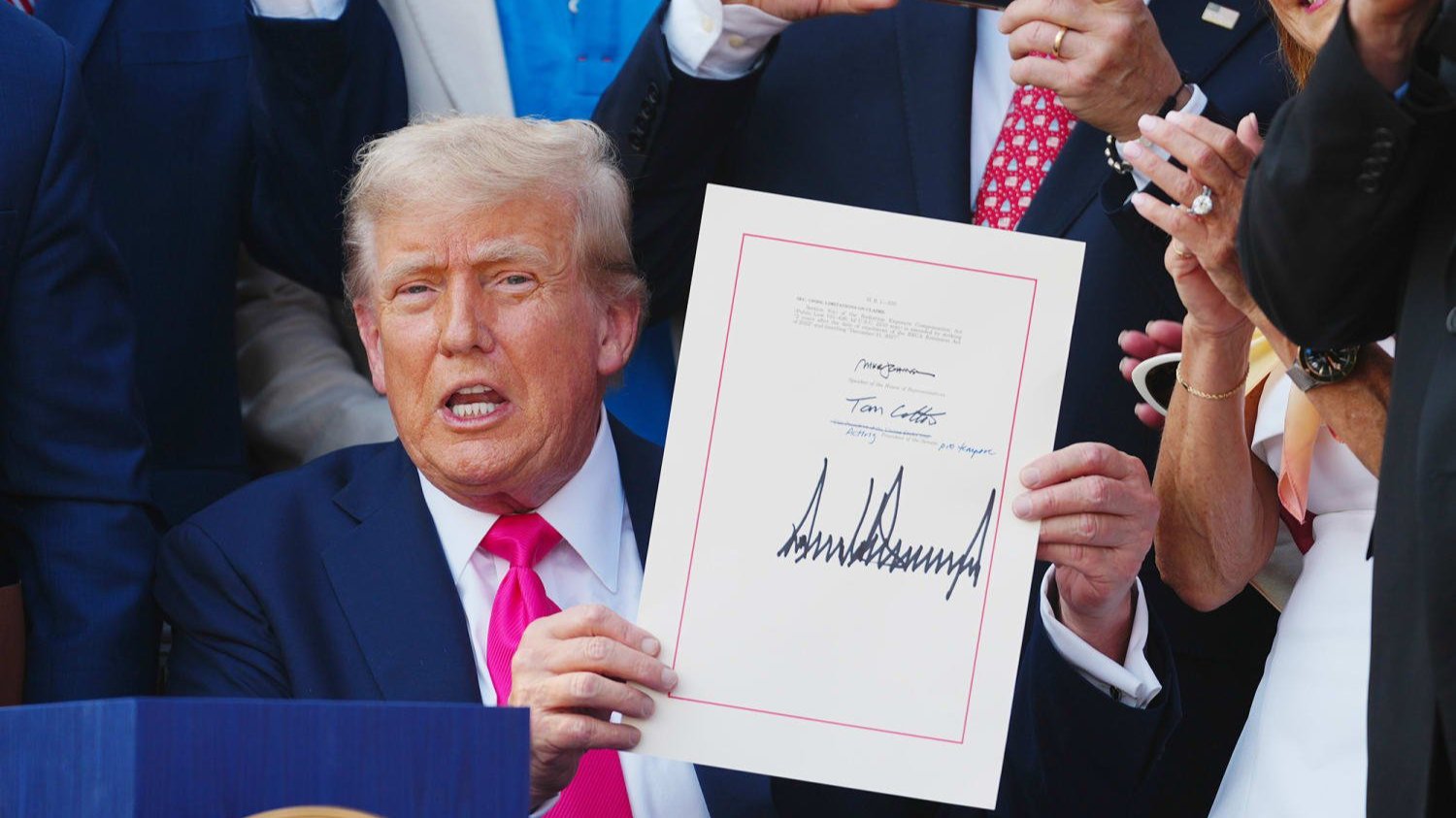 Trump signing the 'big beautiful bill'