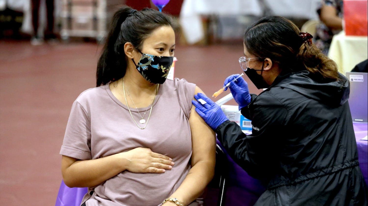 Pregnant person receives vaccine