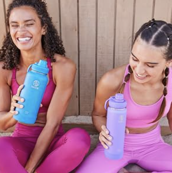 women holding bottle