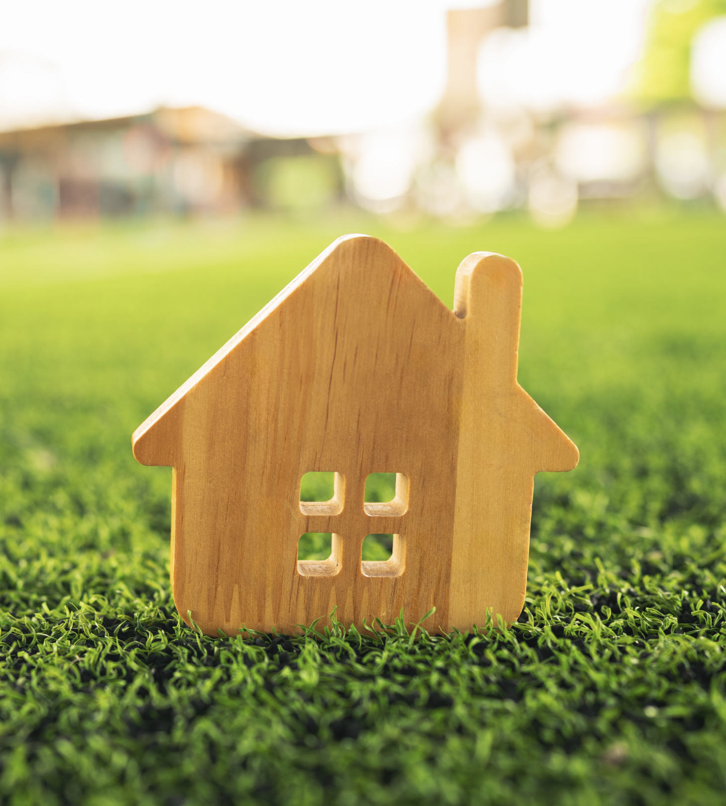 wood home in grass