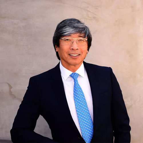  Dr. Patrick Soon-Shiong, in suit and tie, smiles for a photo.