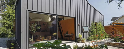 Photo of an accessory dwelling unit, a small home separate from a main house. 