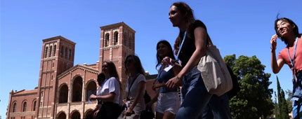 Students walk through the UCLA campus. Negotiations would not preclude a potential lawsuit, leaders said.