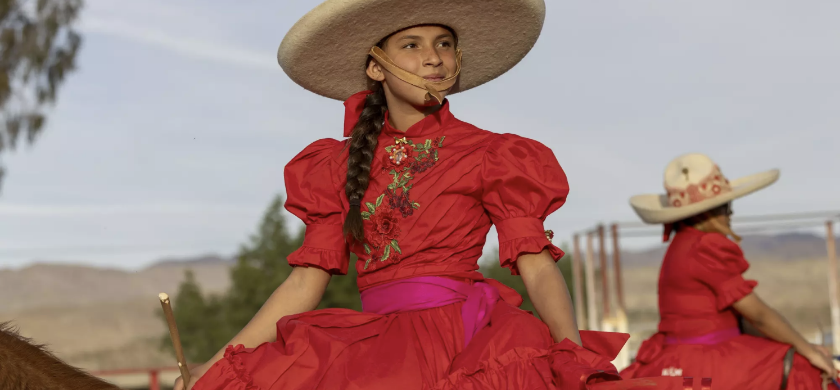 Alicia Ramirez on her horse in the ring at Rancho Zamorez in Coachella, Calif.