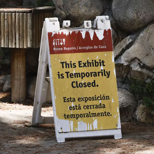  A sign designating a closed exhibit is posted in an animal enclosure at the Los Angeles Zoo.
