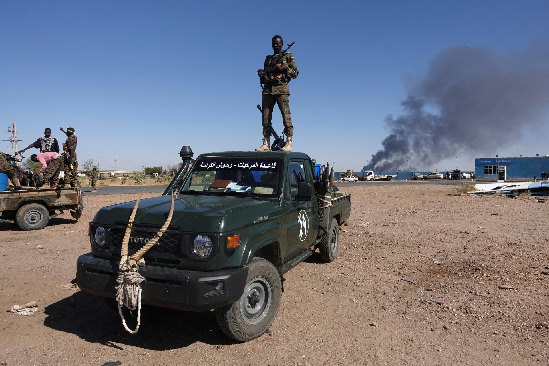 A Sudan's army soldier stands on a vehicle after the army's liberation of an oil refinery, in North Bahri, Sudan, January 25, 2025.