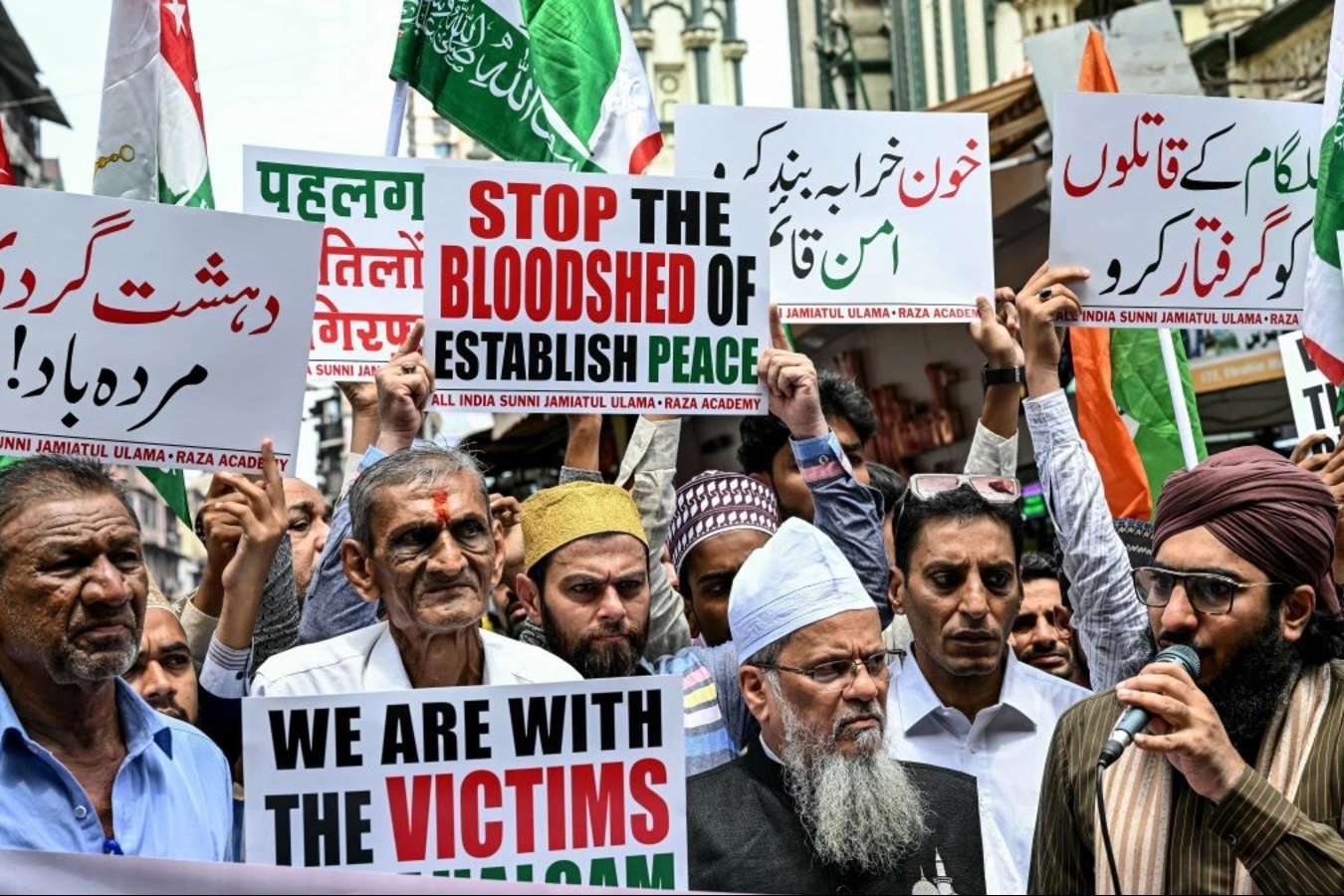 A Hindu resident in Mumbai joins Muslim demonstrators as they shout slogans during a protest to condemn the terror attack in Pahalgam, Kashmir.