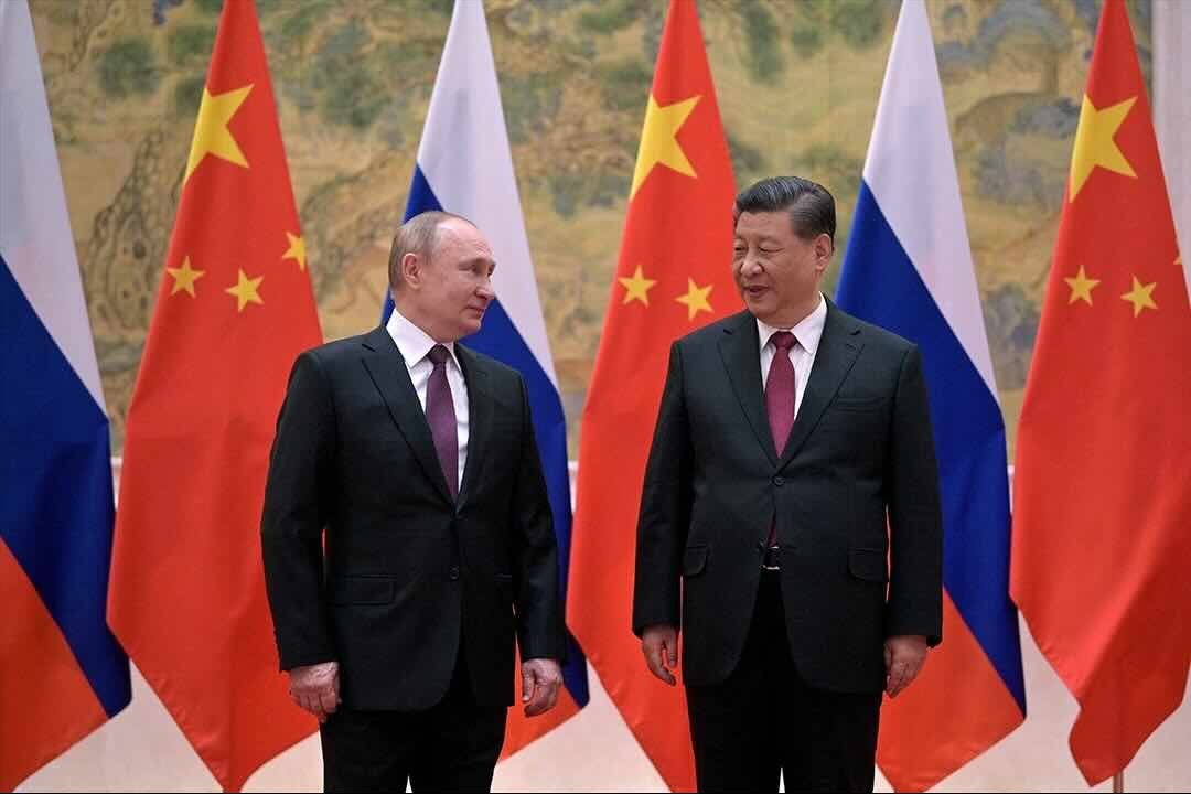Russian President Vladimir Putin attends a meeting with Chinese President Xi Jinping in Beijing, on February 4, 2022.
