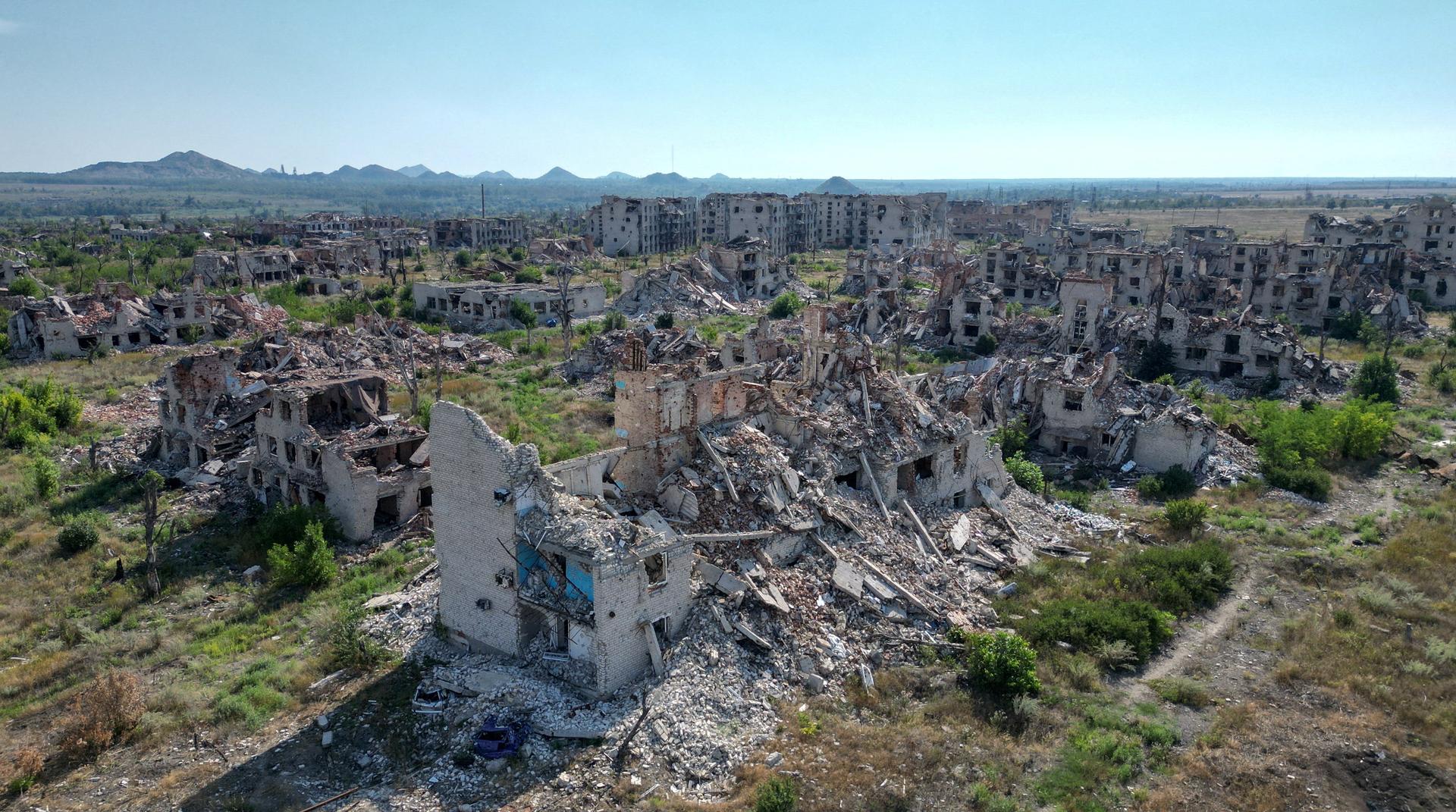 A drone view shows the ruins of residential buildings in the abandoned town of Marinka in Ukraine after it was destroyed in the war.