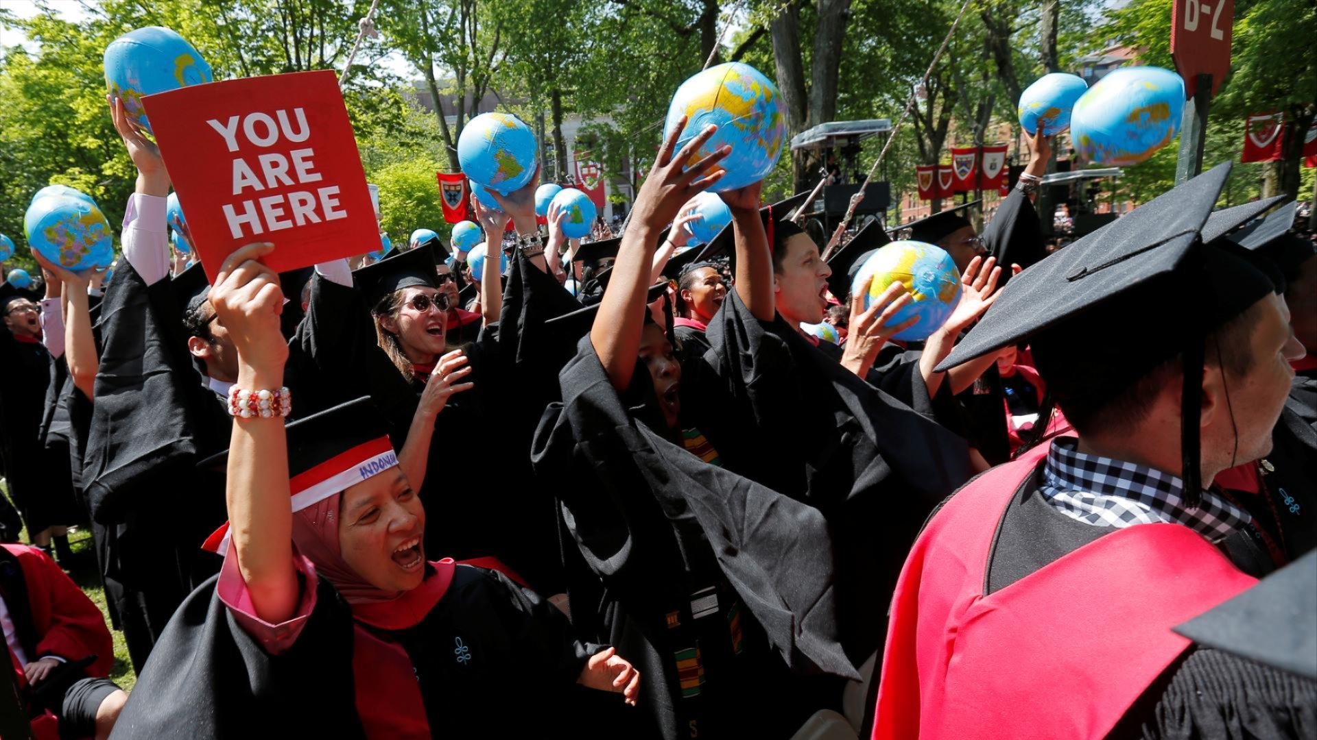 Graduating students at the John F. Kennedy School of Government cheer as they receive their degrees during the 365th Commencement Exercises at Harvard University in Cambridge, Massachusetts, U.S. May 26, 2016.