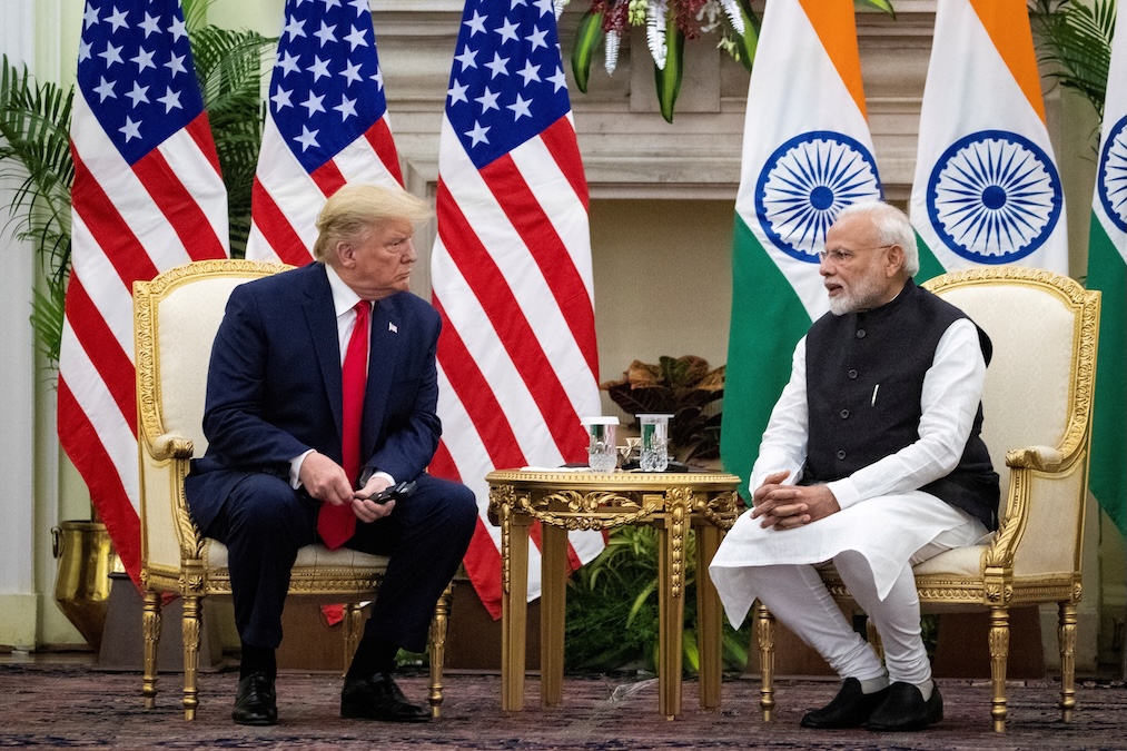 Indian Prime Minister Narendra Modi speaks to U.S. President Donald Trump during a meeting at Hyderabad House in New Delhi, India, February 25, 2020. (Al Drago/Reuters)