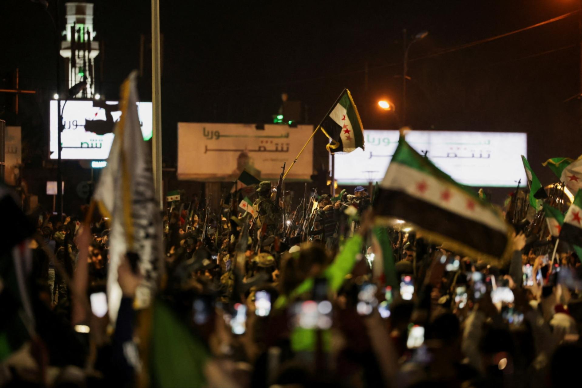 Demonstration marking the 14th anniversary of the start of the Syrian conflict, in Damascus