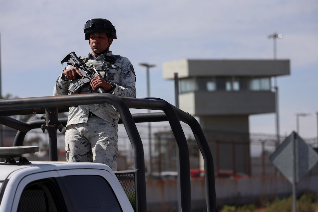 A guard keeps watch outside the prison where ex-Gulf Cartel chief Osiel Cardenas is imprisoned after being deported from the U.S., in Almoloya de Juarez, Mexico December 17, 2024. (Luis Cortes/Reuters)