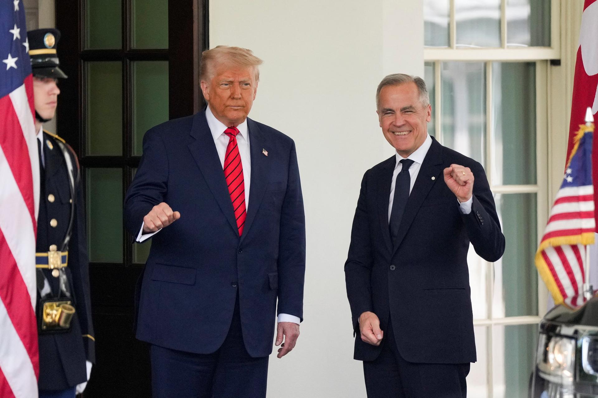 U.S. President Donald Trump and Canadian Prime Minister Mark Carney gesture as they meet at the White House in Washington, D.C., U.S., May 6, 2025.