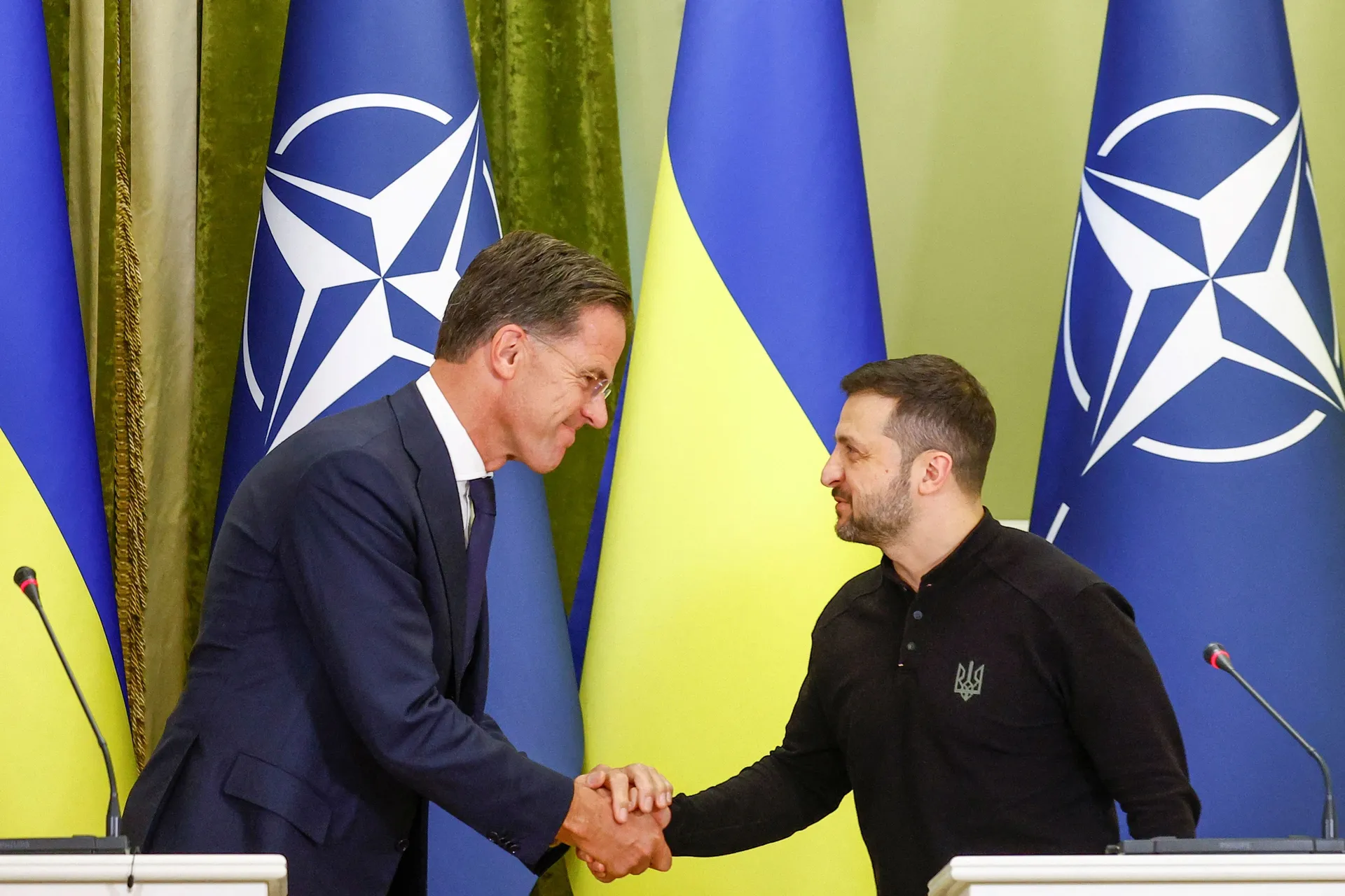 Ukrainian President Volodymyr Zelenskyy and NATO Secretary General Mark Rutte shake hands during a press conference in Kyiv, Ukraine. (Valentyn Ogirenko/Reuters)