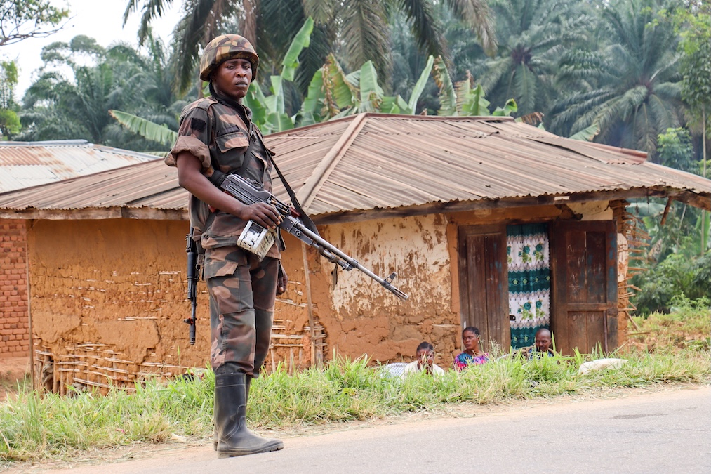 A soldier from Armed Forces of the Democratic Republic of the Congo (FARDC) stands guard in North Kivu province February 4, 2025. (Gradel Muyisa Mumbere/Reuters)