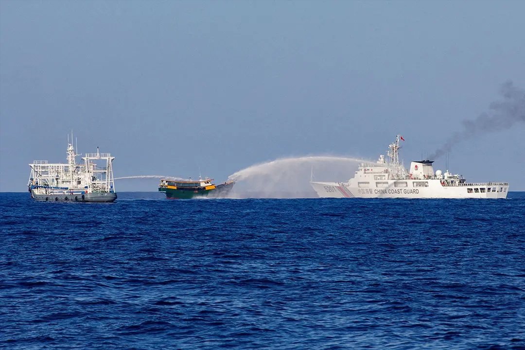 Chinese Coast Guard vessels fire water cannons towards a Philippine vessel on a resupply mission to the Second Thomas Shoal on May 4, 2024. 