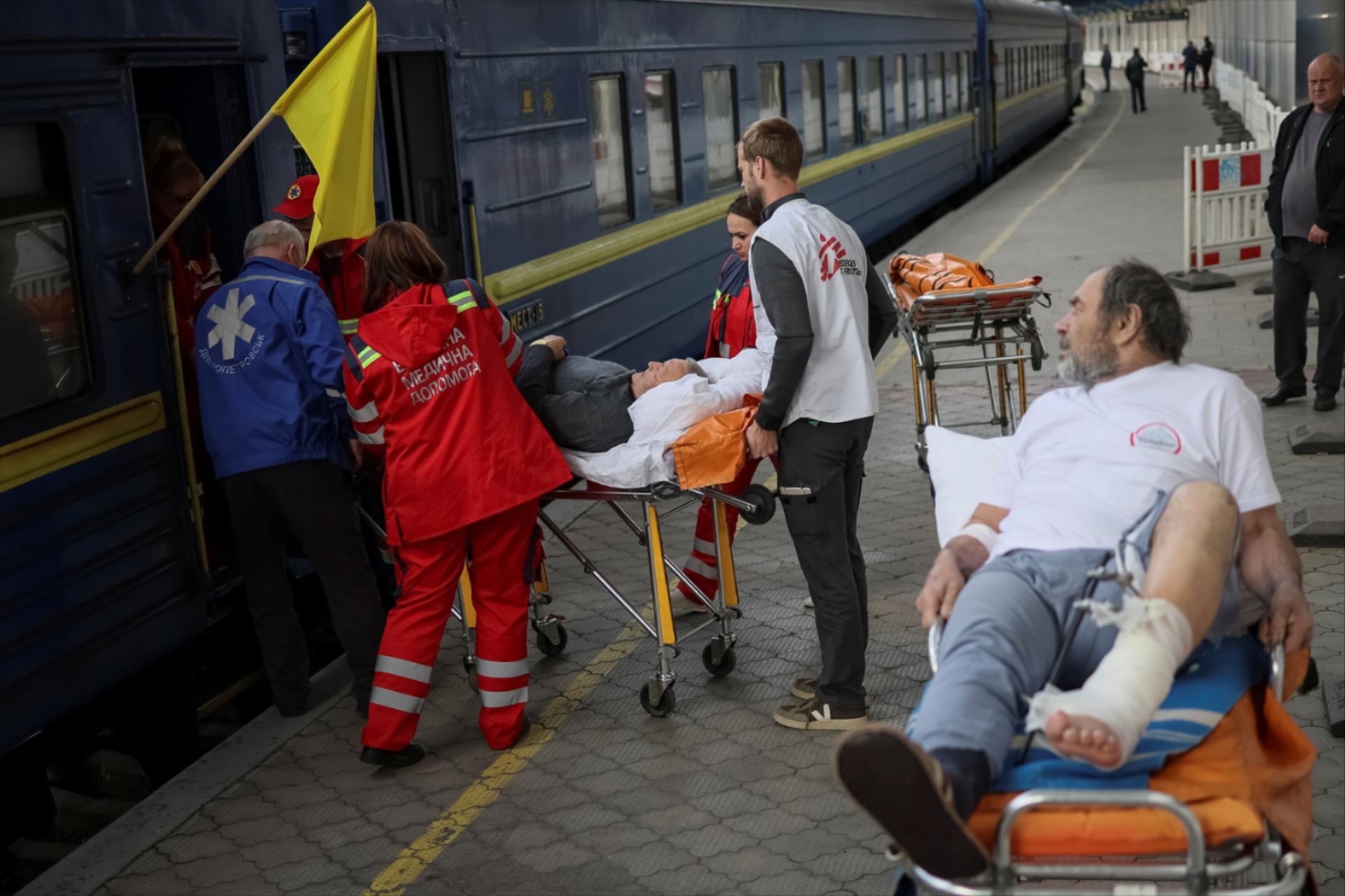 Medical workers get patients on a specially equipped train, run by Medicins Sans Frontieres (MSF) in collaboration with Ukraine's Ministry of Health and National Railways, to evacuate wounded people from war-affected areas of eastern Ukraine, amid Russia's invasion of the country, in Dnipro, Ukraine May 10, 2022.