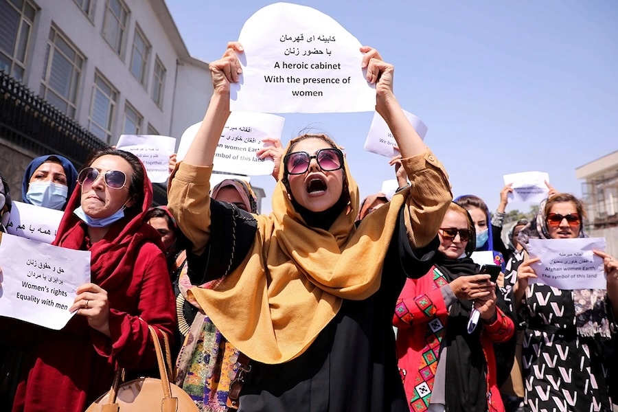 Afghan women’s rights defenders and civil activists protest in front of the presidential palace in Kabul on September 3, 2021. (Reuters)