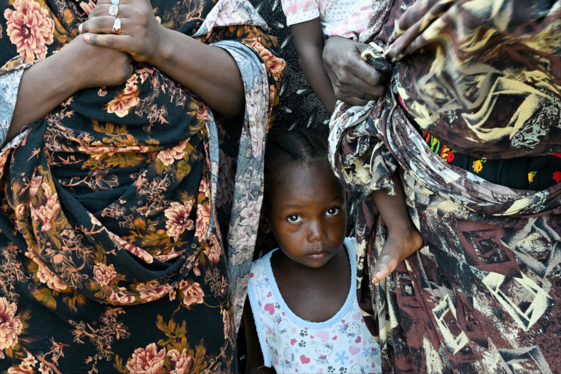 Amid a landscape of destruction, displaced Sudanese take refuge at a school-turned-shelter in Port Sudan.